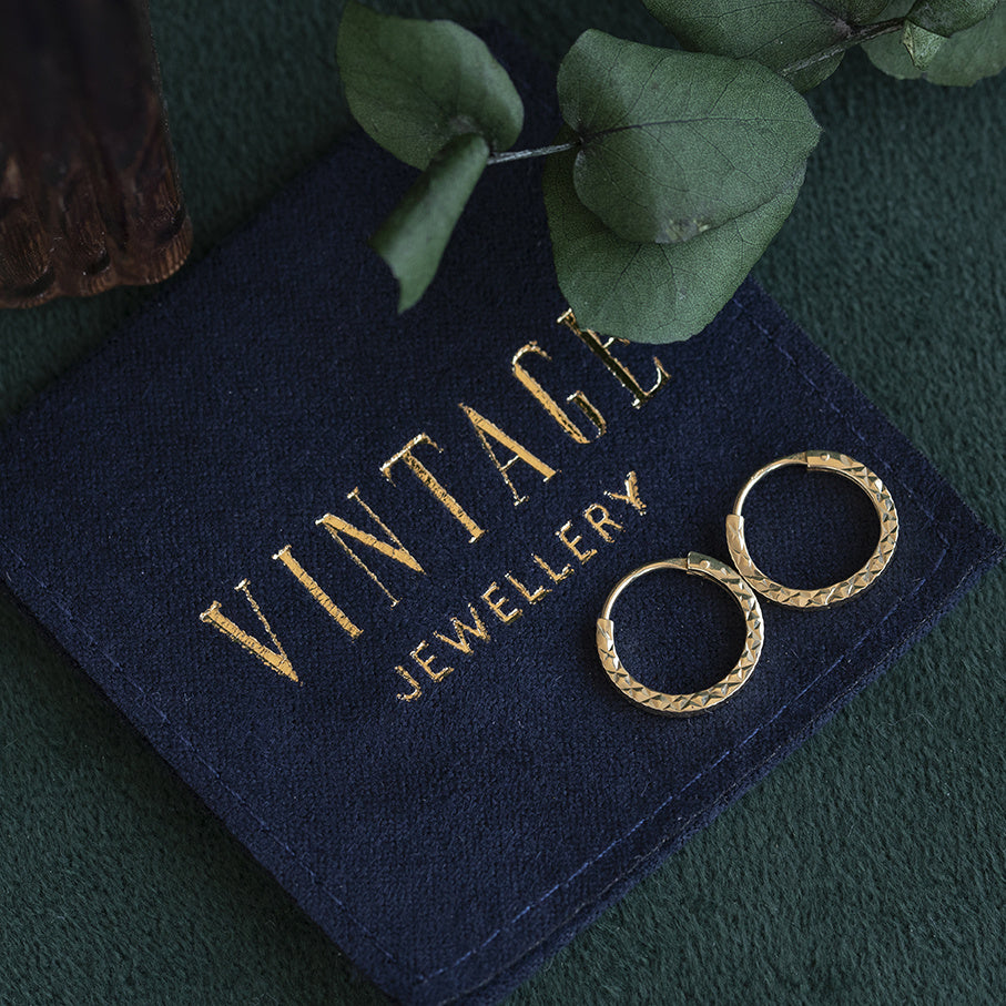 Vintage fantasie oorringen 8 krt