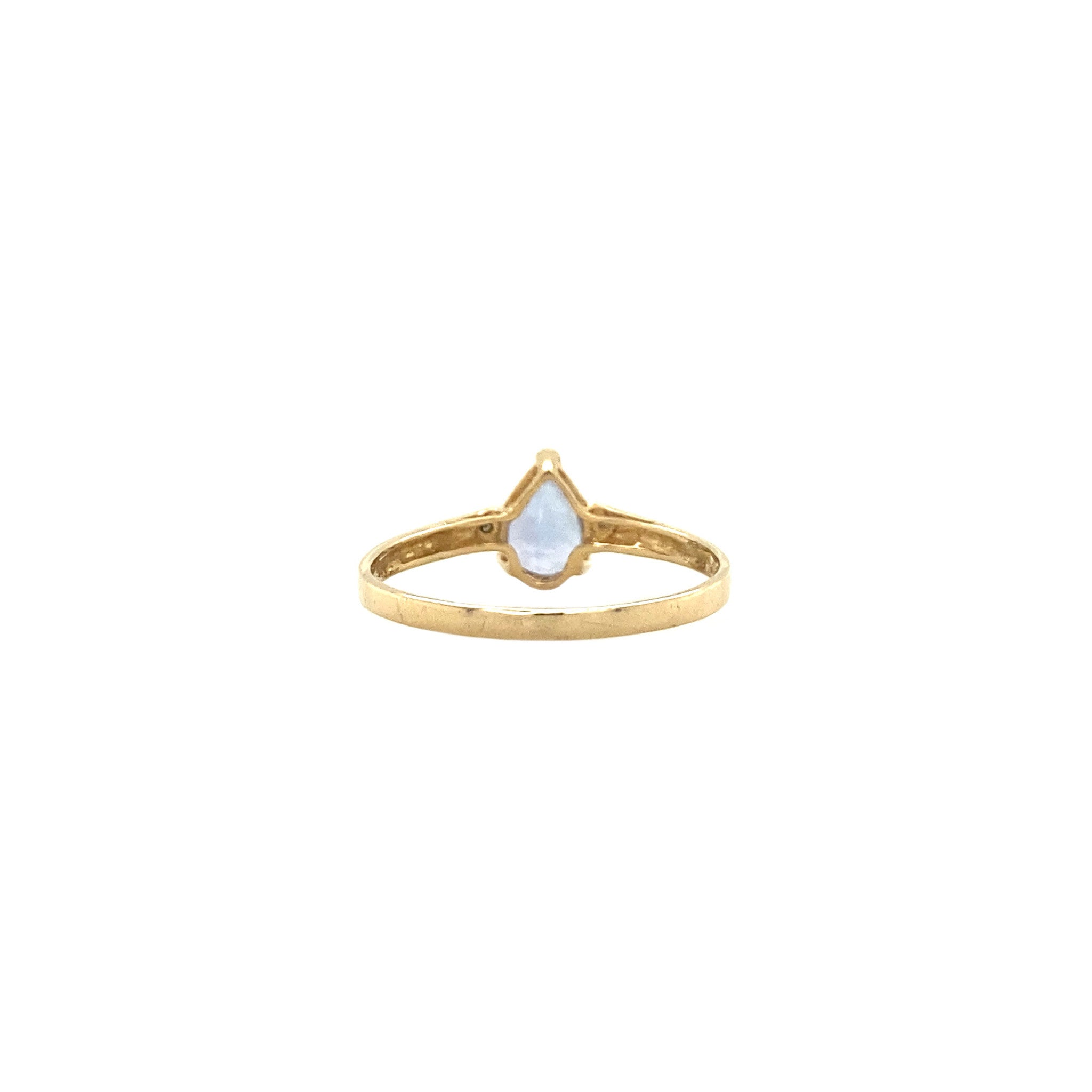 14 kt gold ring with a diamond and a colored gemstone