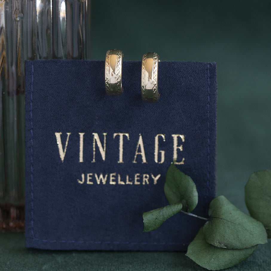 Gouden vintage fantasie oorringen 14 kt