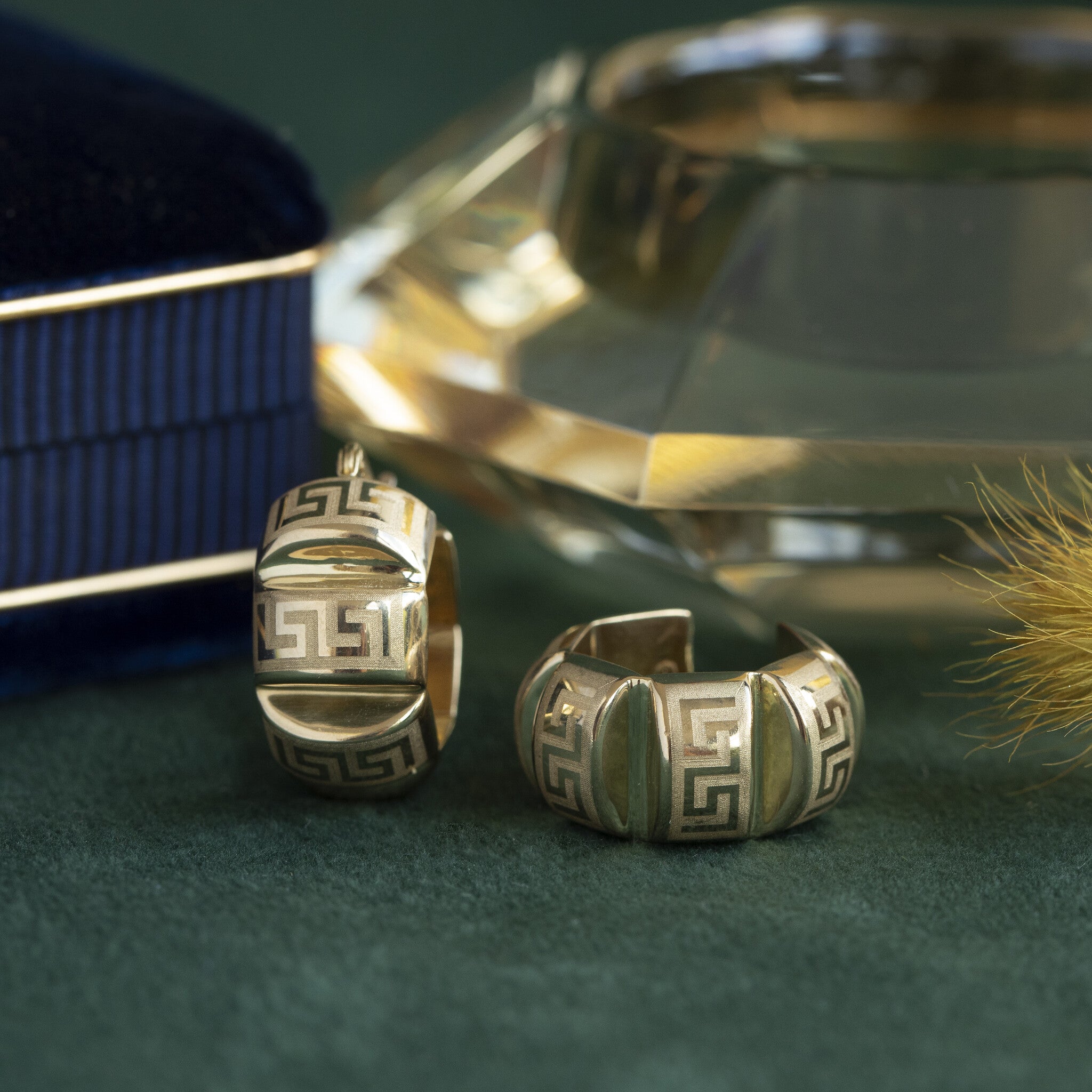 Gouden fantasie oorringen 18 krt