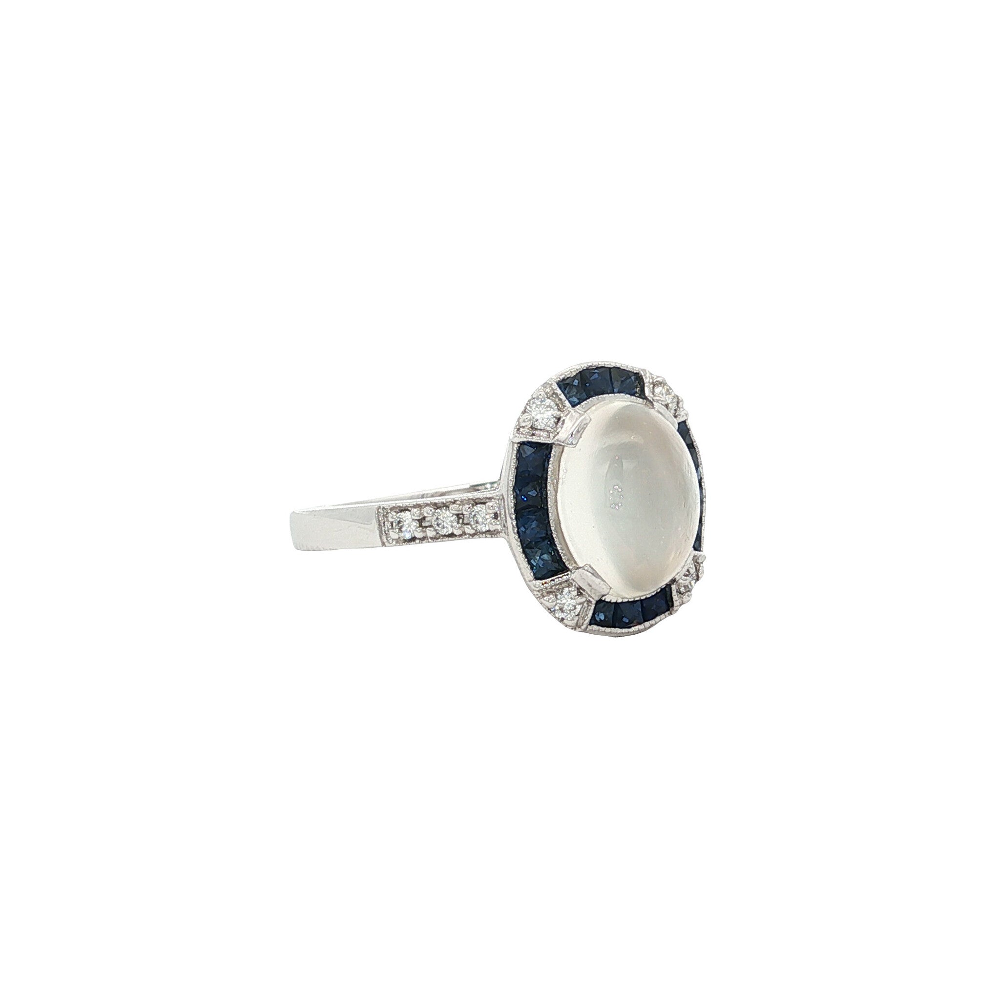 Gold ring with moonstone, sapphire and diamond 14 kt