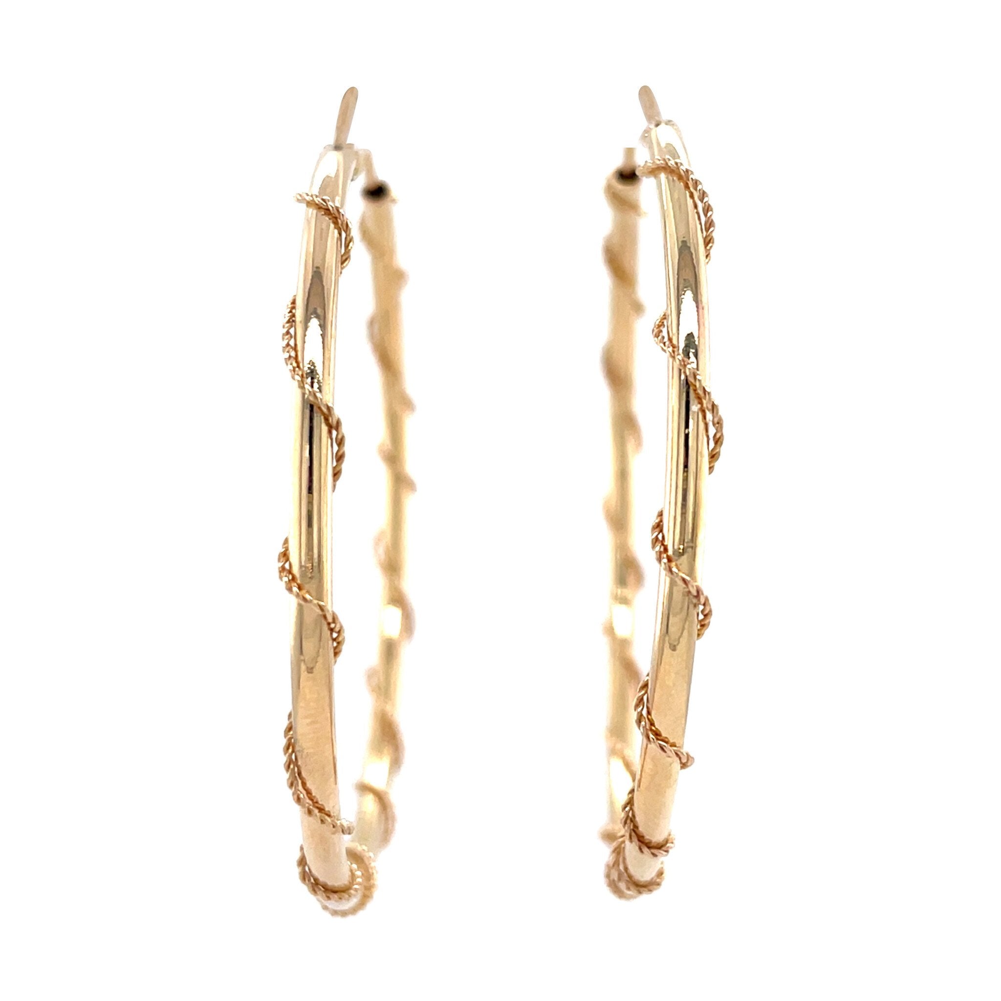 Gouden vintage getordeerde oorringen 14 krt