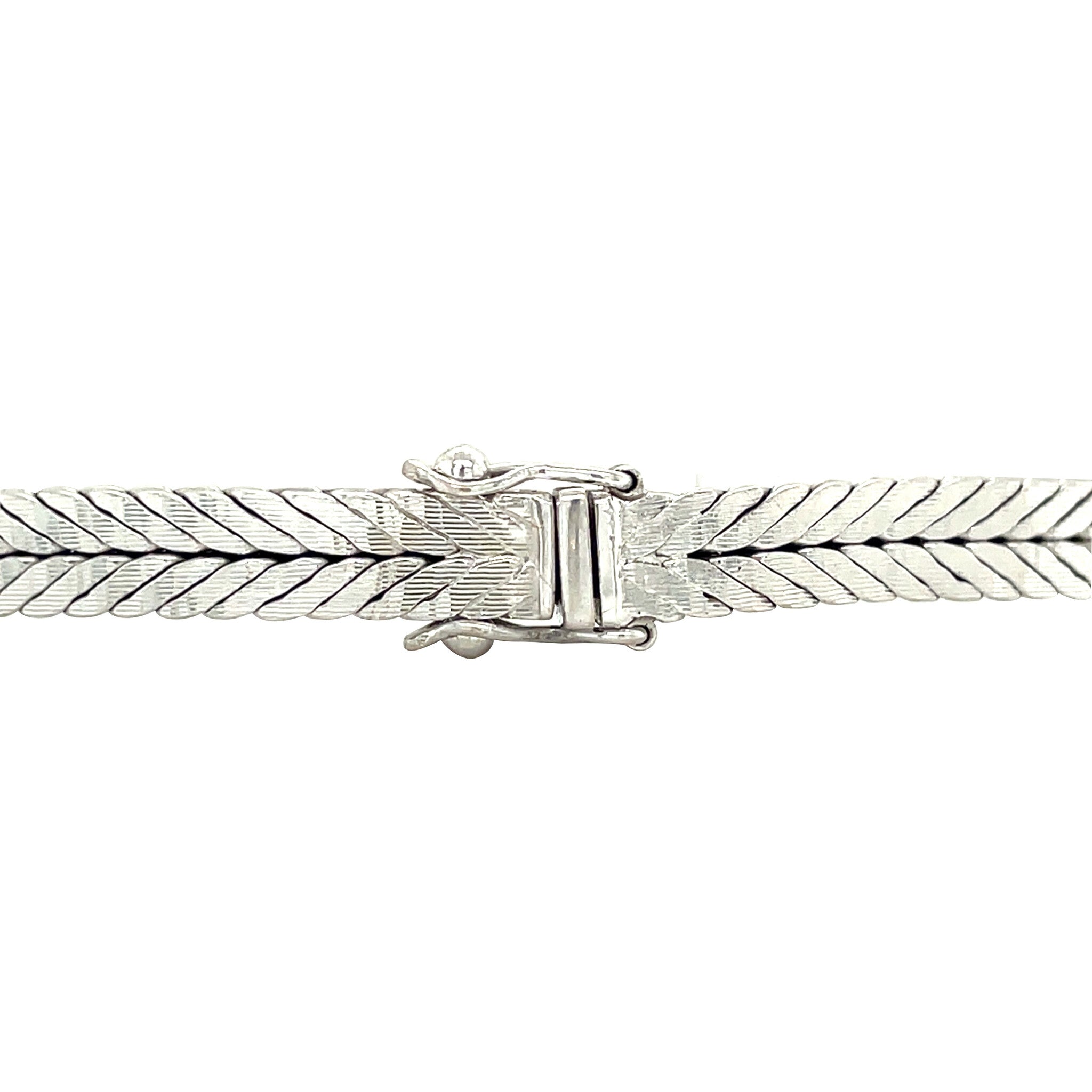 Vintage 14 kt white gold entourage bracelet with diamond