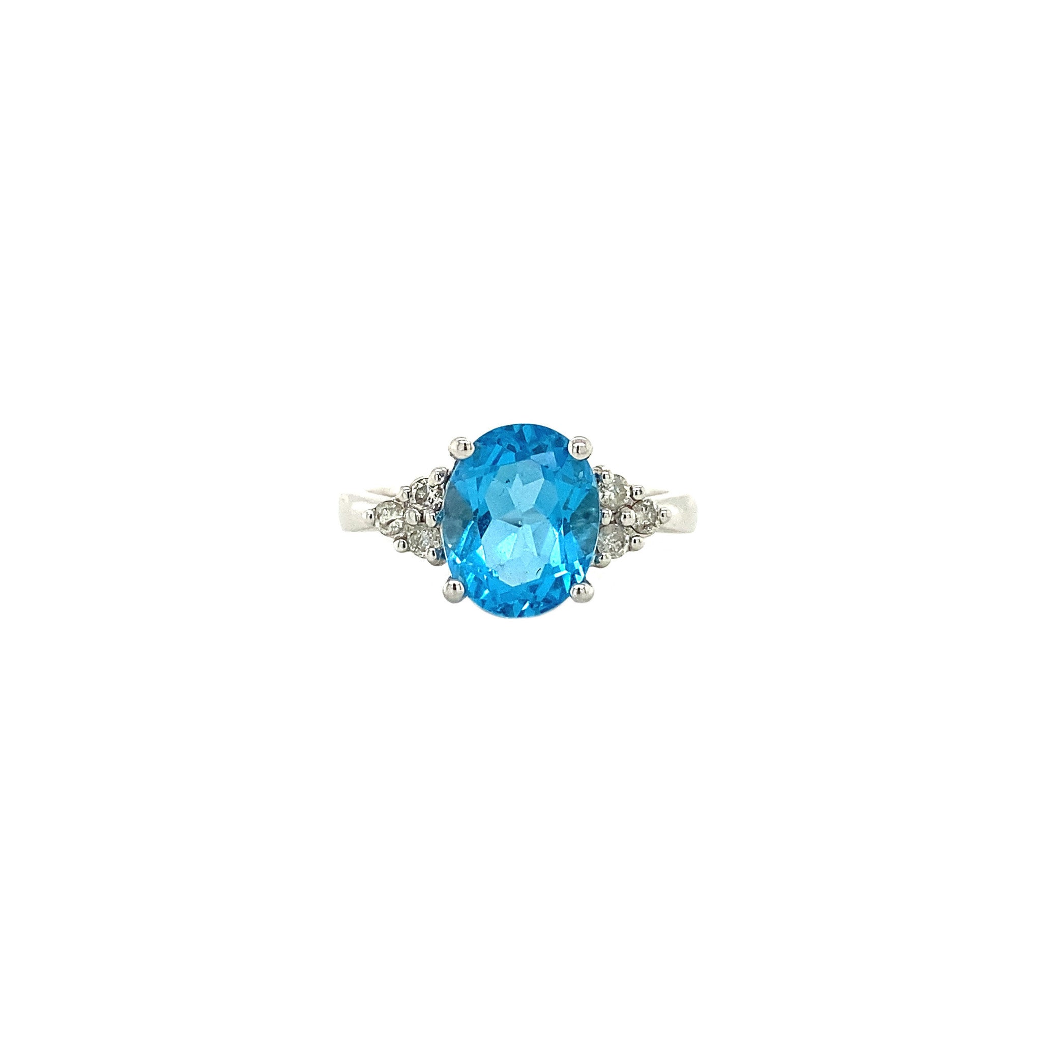 14 kt white gold ring with topaz and diamond