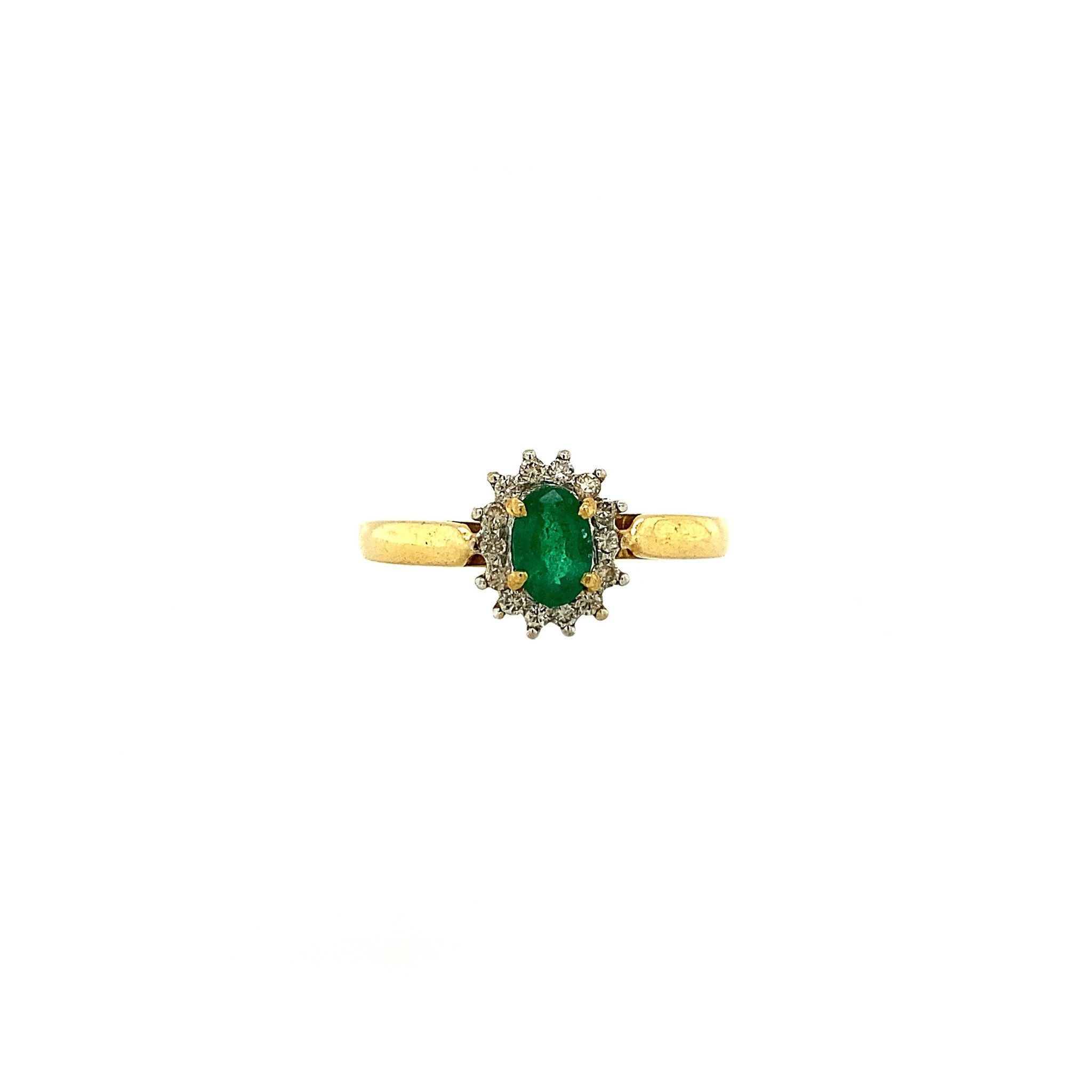 14 kt gold ring with emerald and diamond