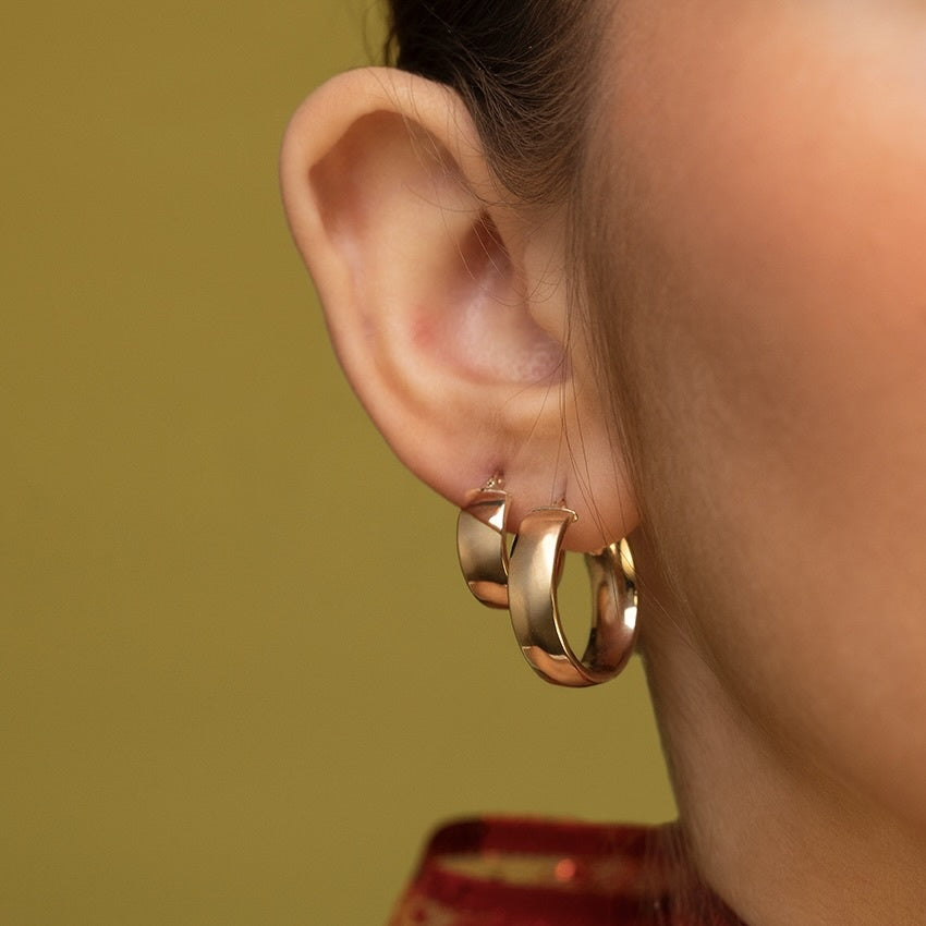 Gladde vintage oorringen 9 kt