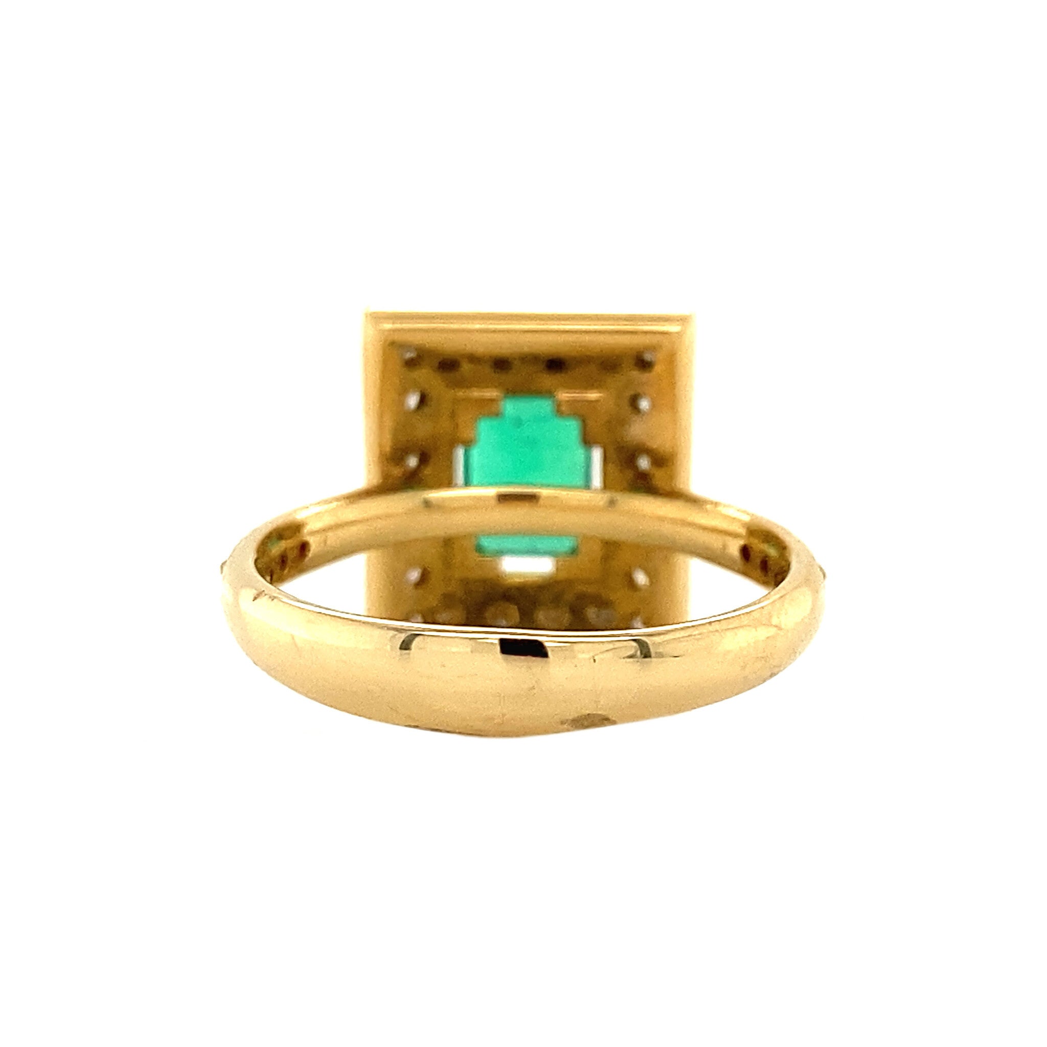 Gold ring with emerald, garnet and diamond 18 krt