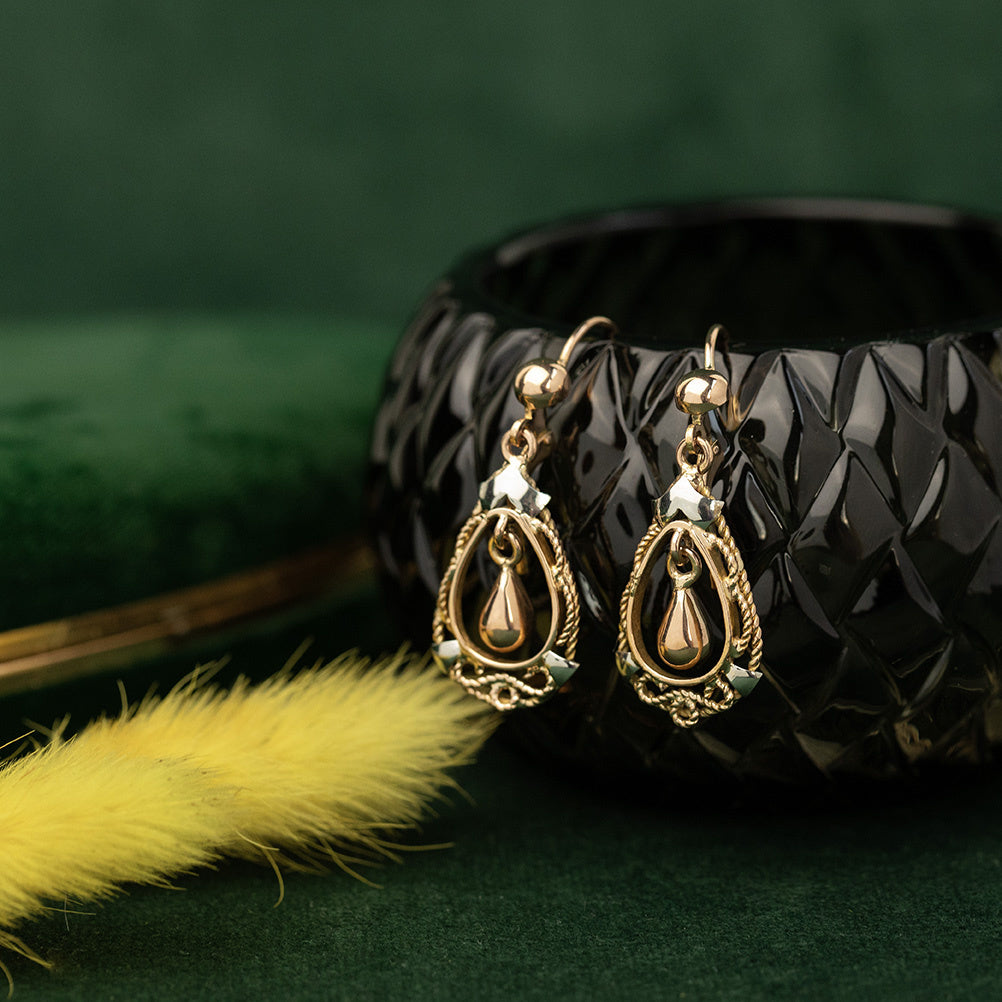 Gouden fantasie oorhangers 14 krt