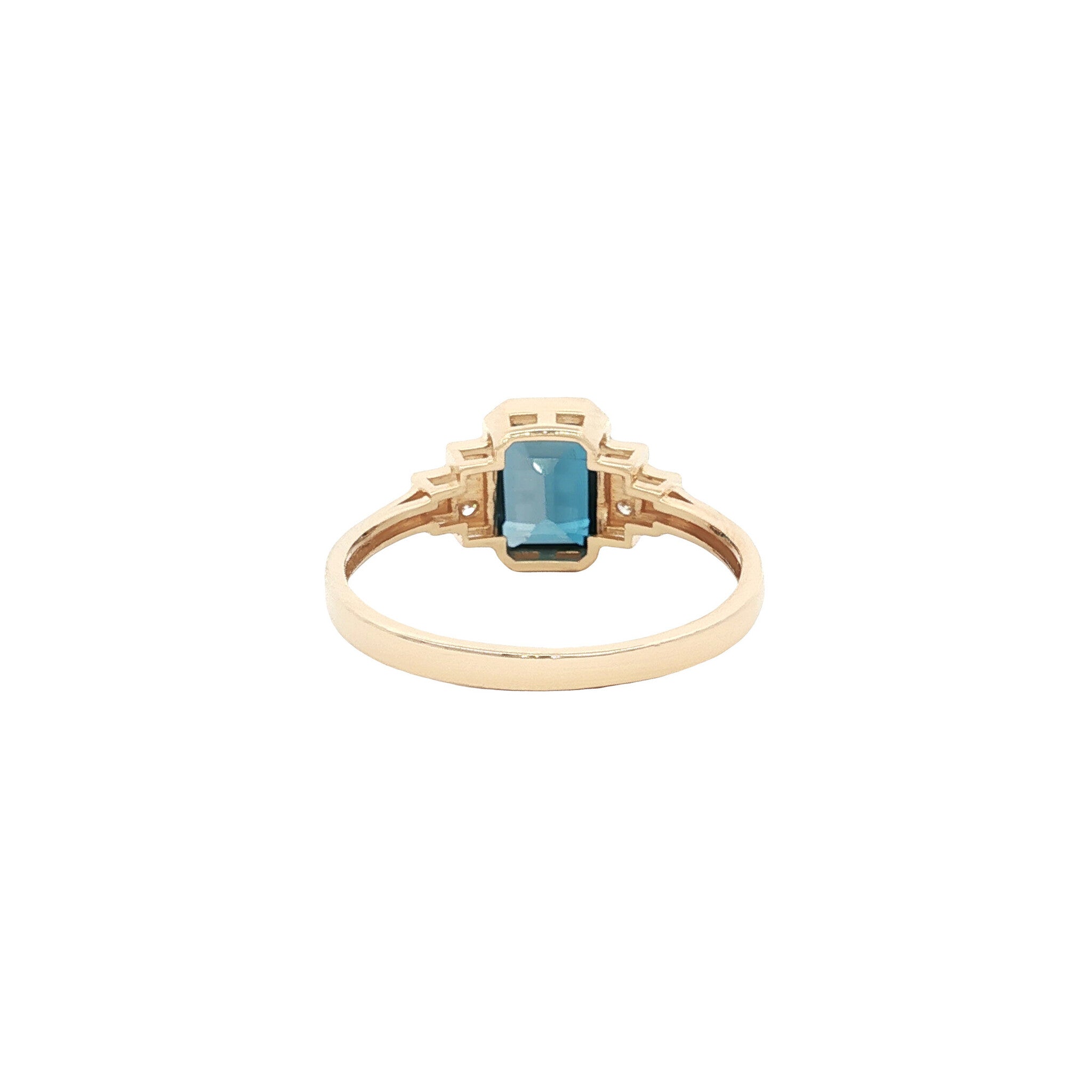 14 kt gold ring with blue topaz and diamond
