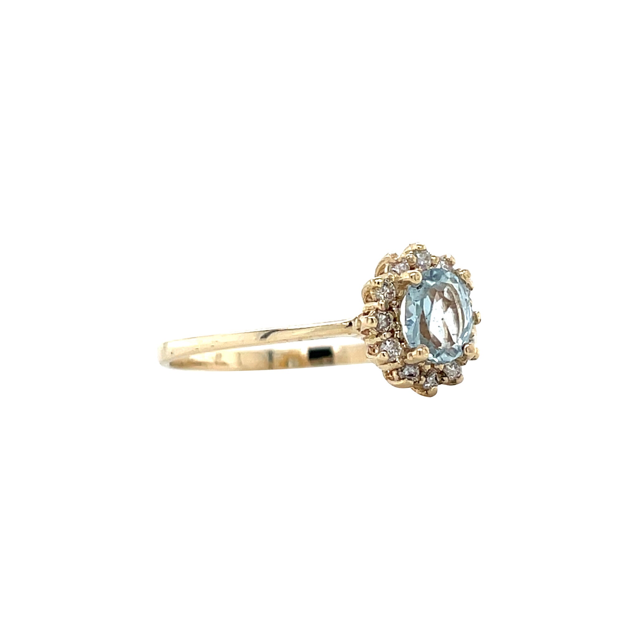 Vintage gold entourage ring with aquamarine and diamond, 14 kt