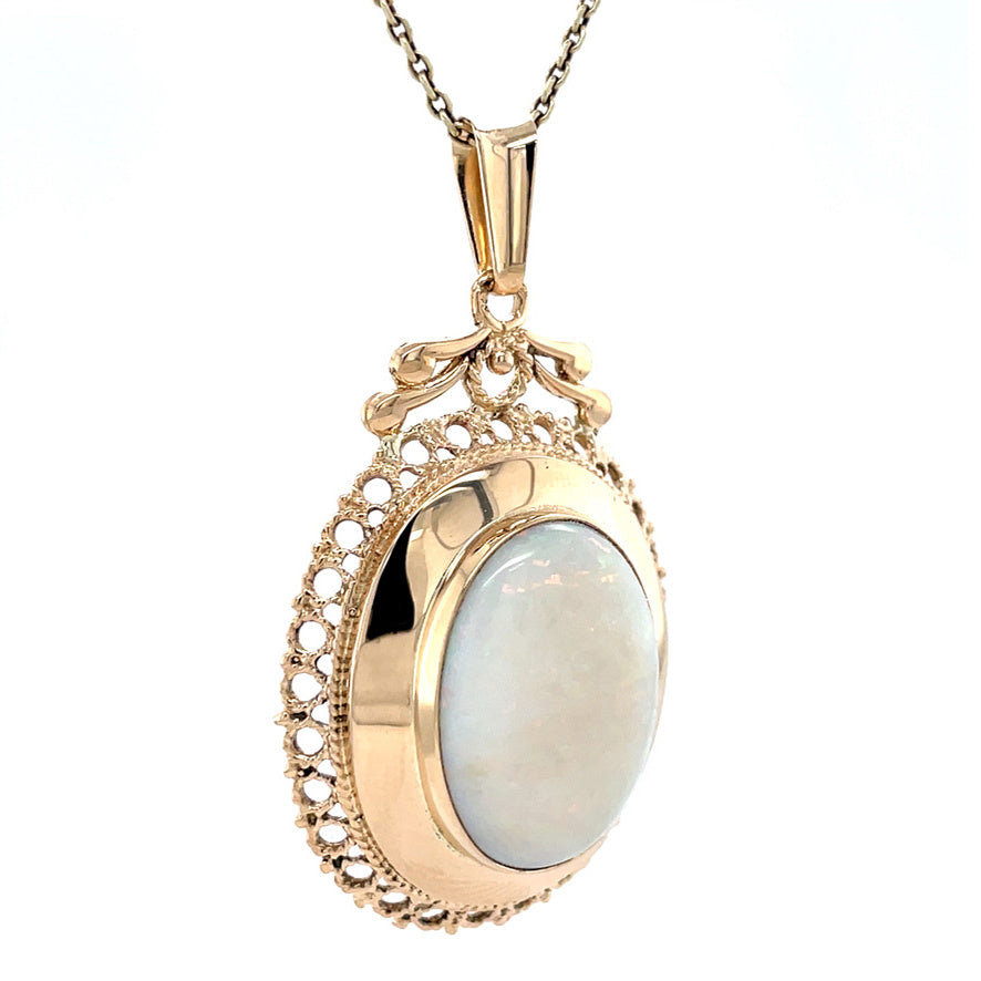 Golden vintage pendant with opal 14 kt