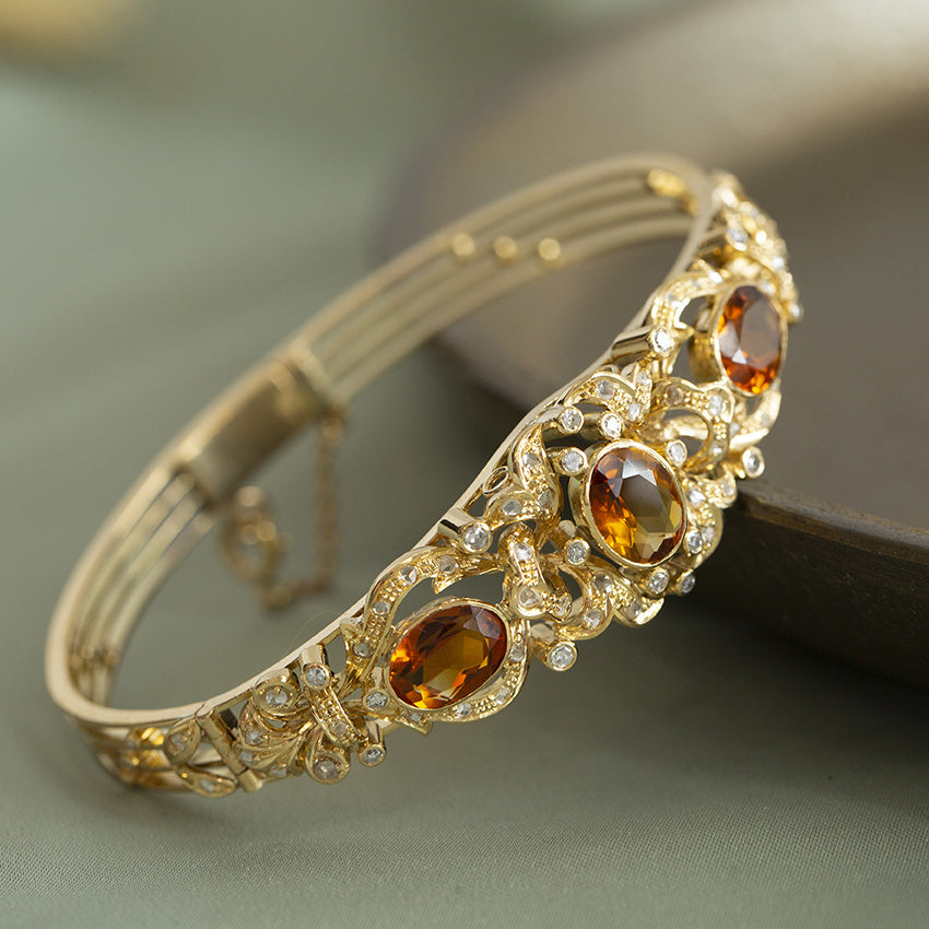 Gouden armband met citrien en diamant 14 krt