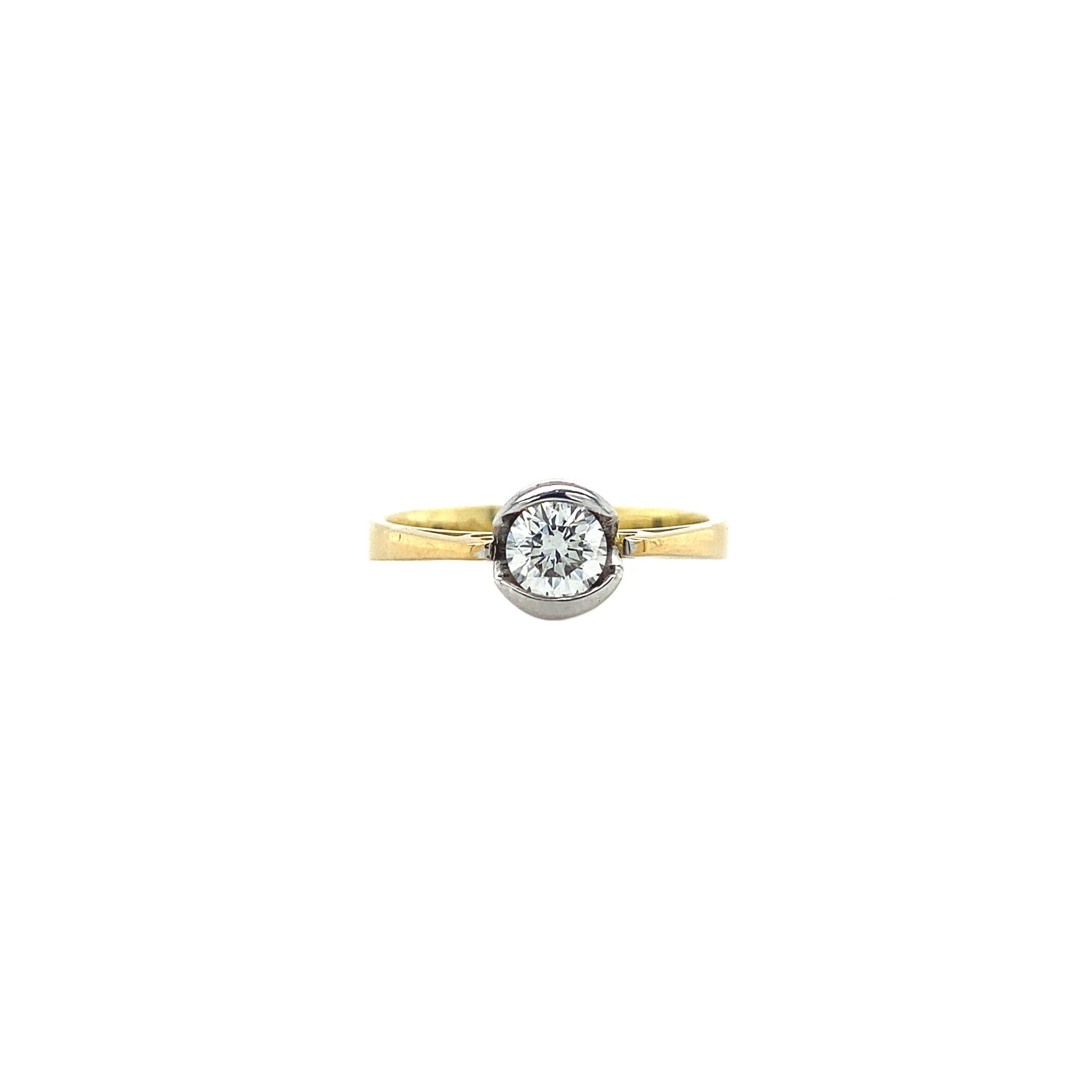 18 kt gold solitaire ring with diamond