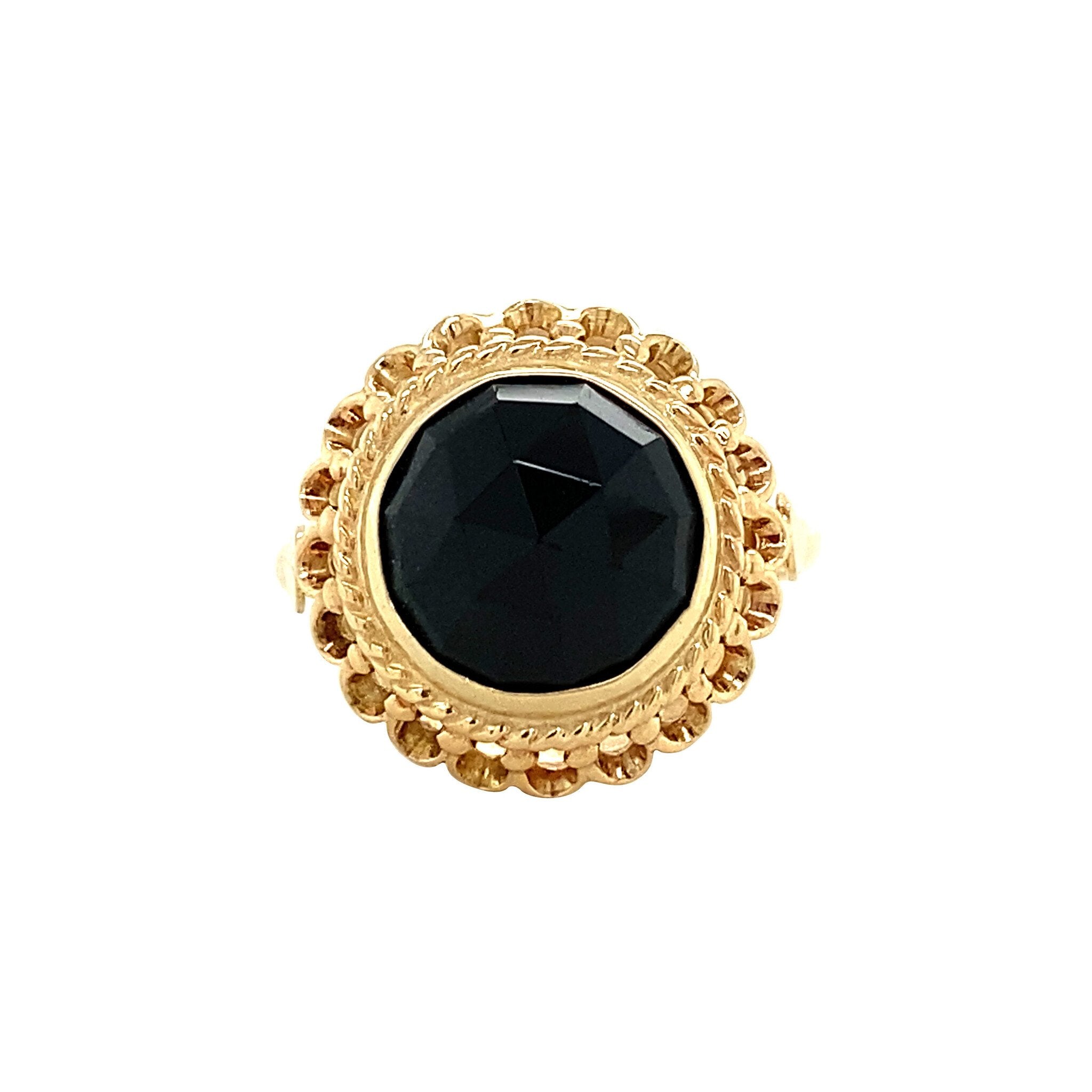 14 kt gold ring with garnet