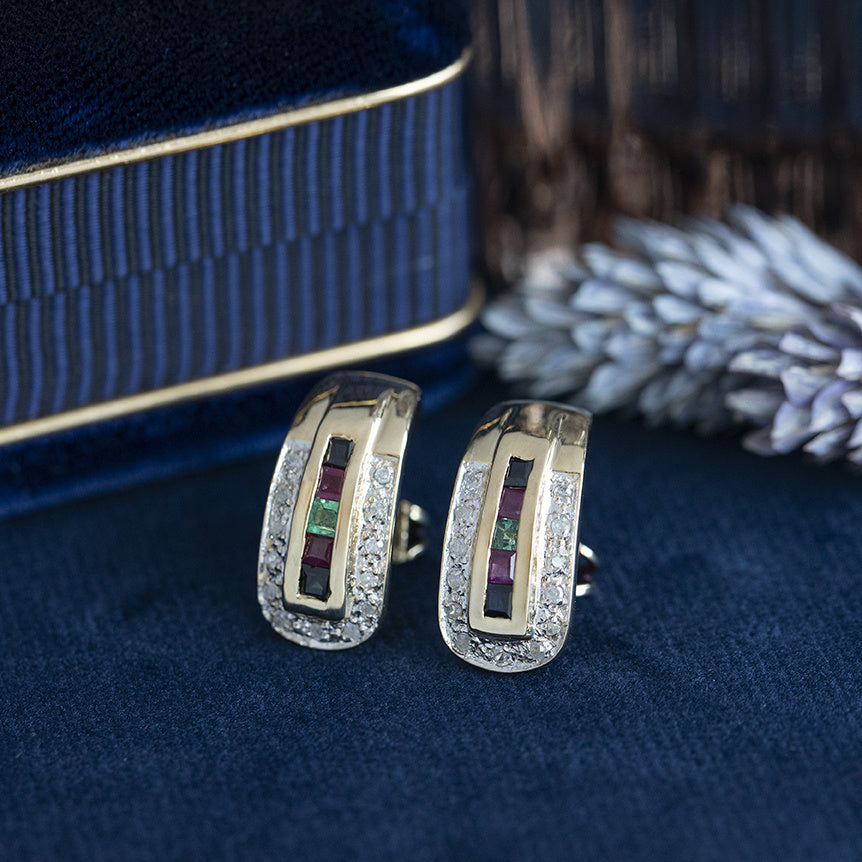 Gouden vintage oorstekers met diamant, robijn, saffier en smaragd 18 krt