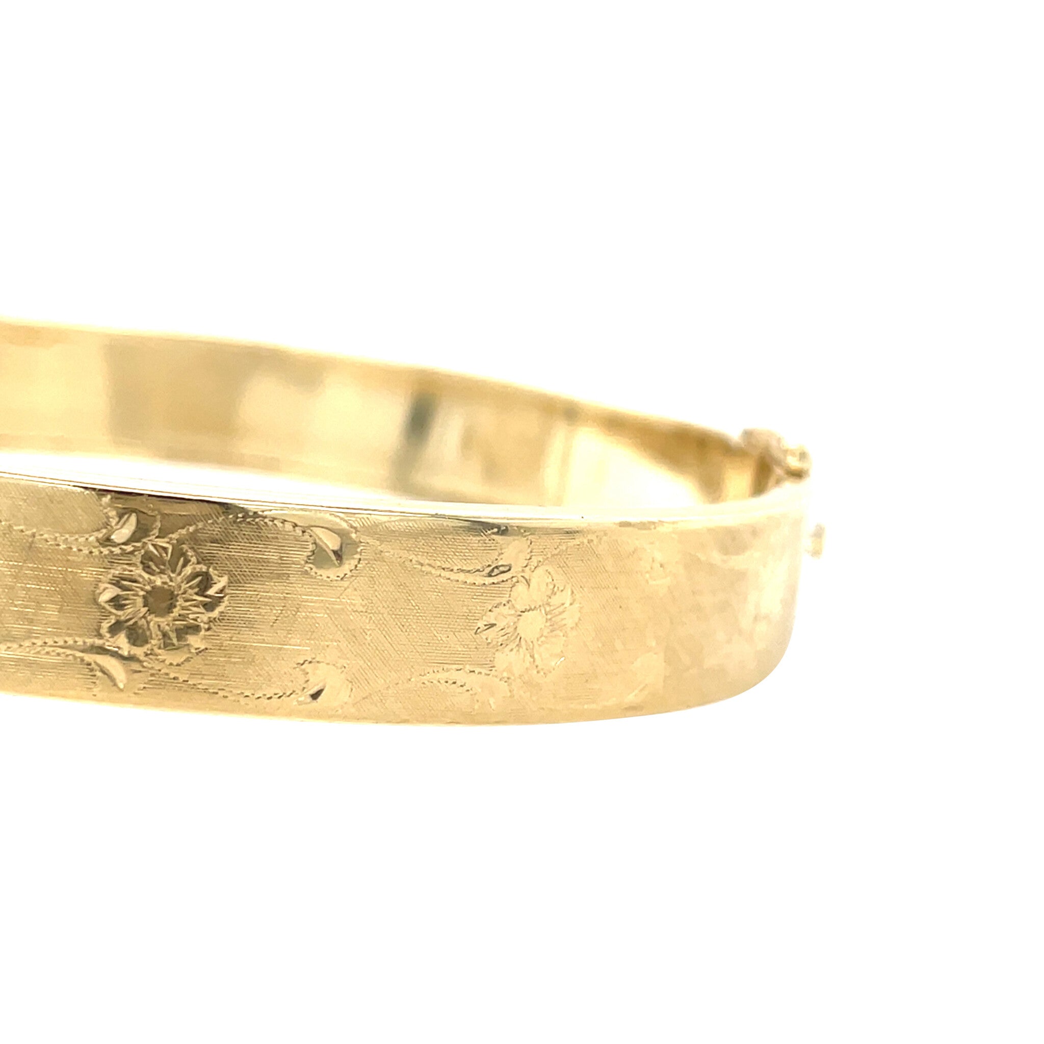 Gouden vintage bangle met gravure 14 krt