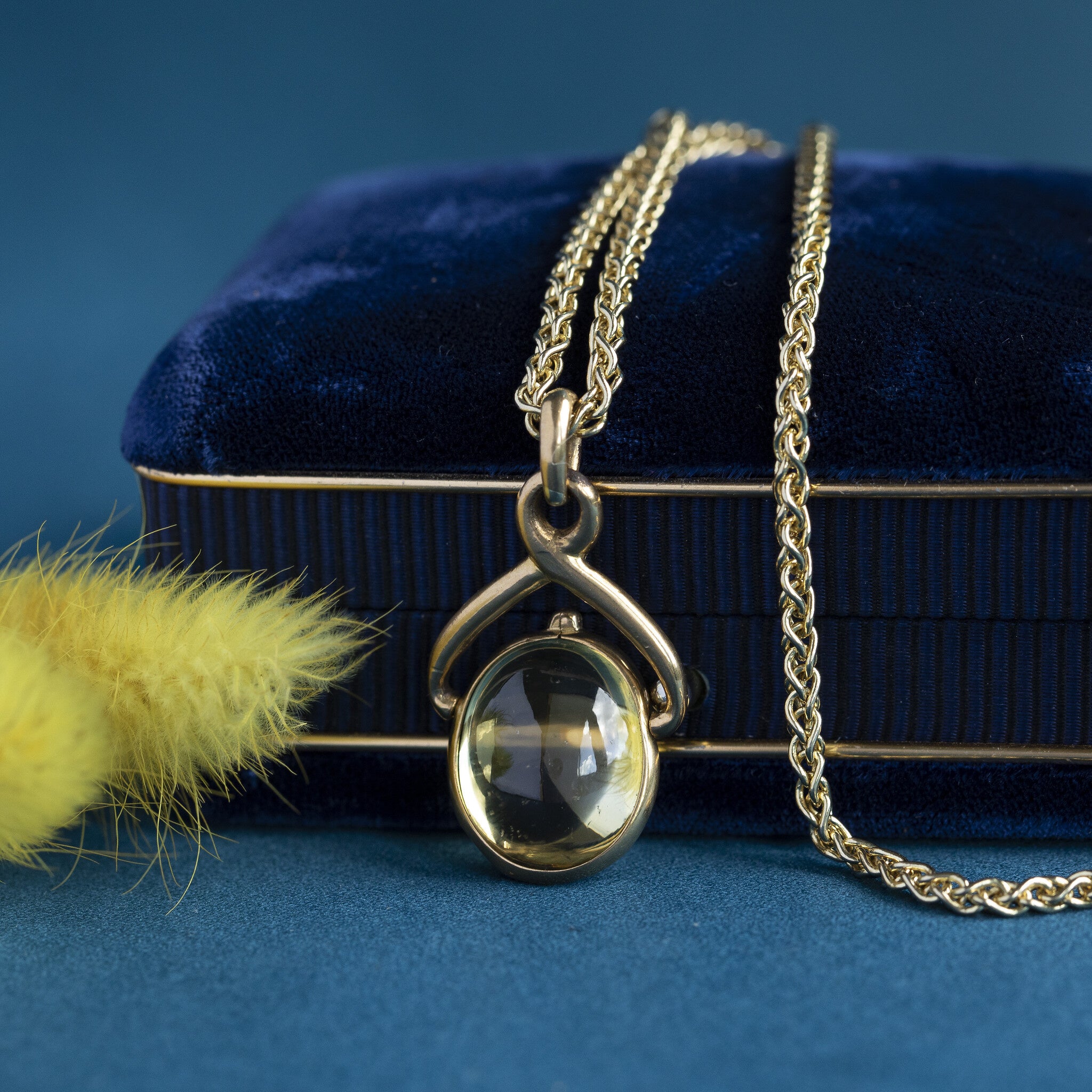 Gouden hanger met gele kleursteen 20 krt