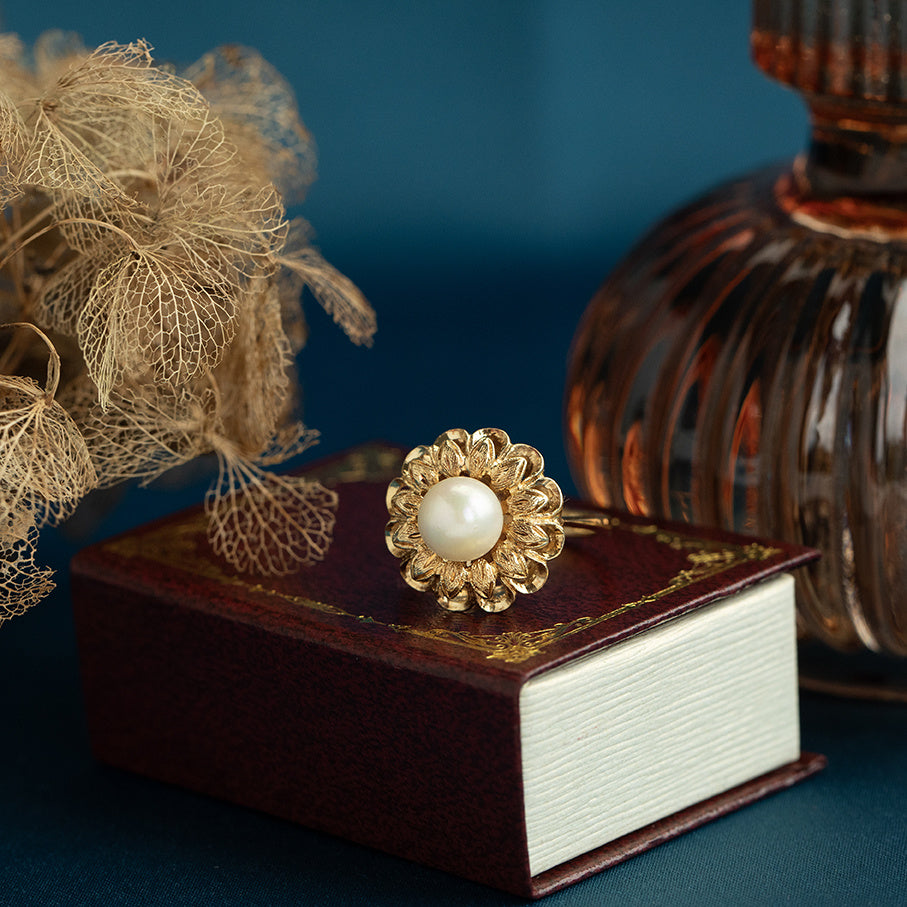 18 kt gold ring with pearl