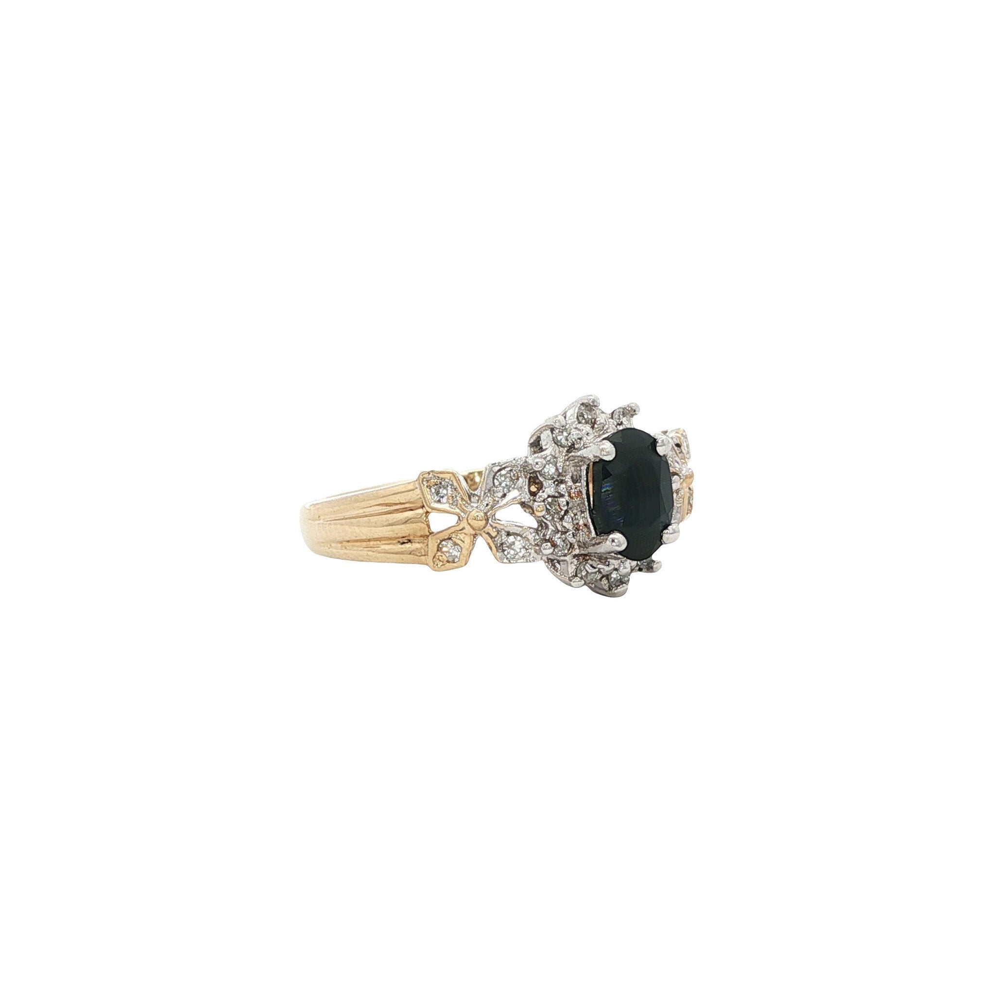 Gouden vintage entourage ring met saffier en diamant 14 kt