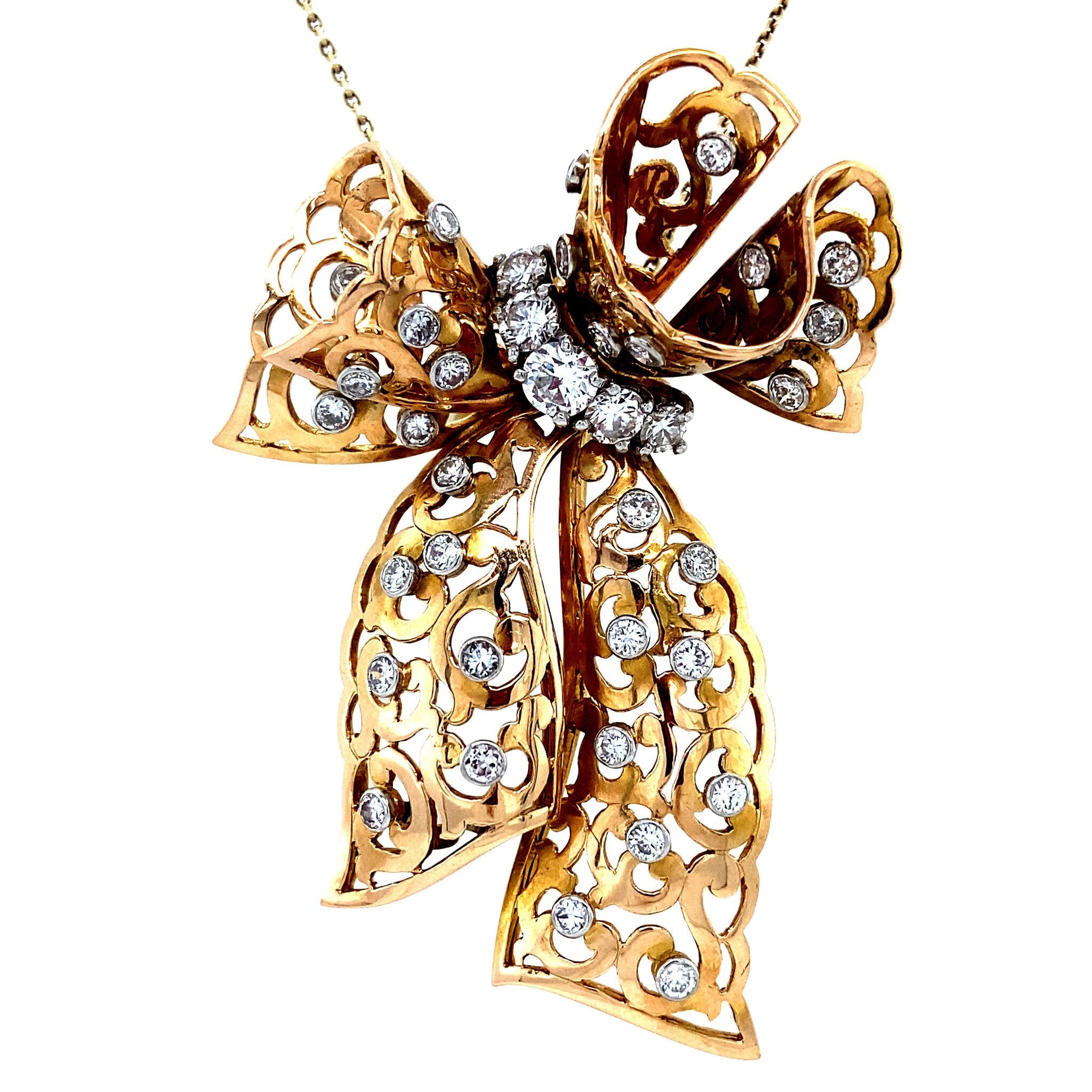 Gouden strik hanger met diamant 14 krt/950