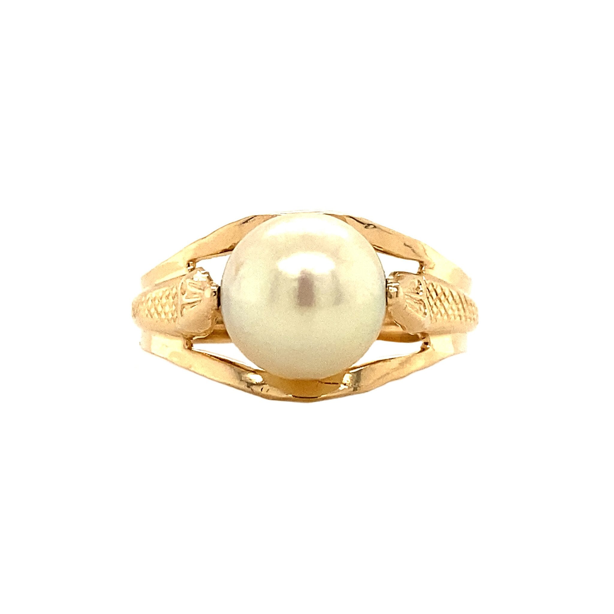 18 kt gold ring with pearl