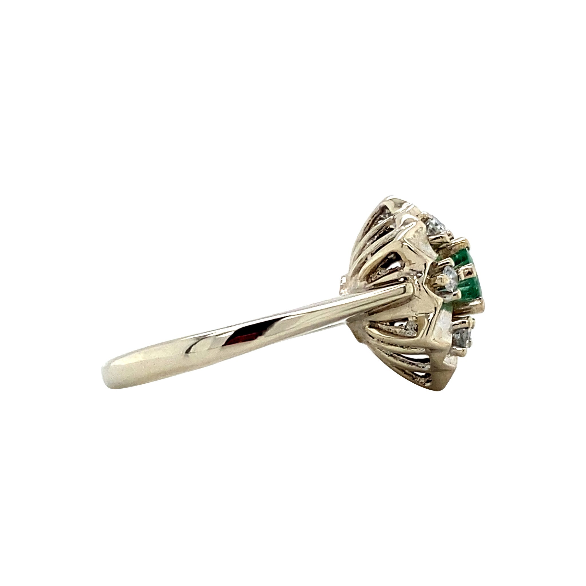 White gold entourage ring with emerald and diamond 14 kt