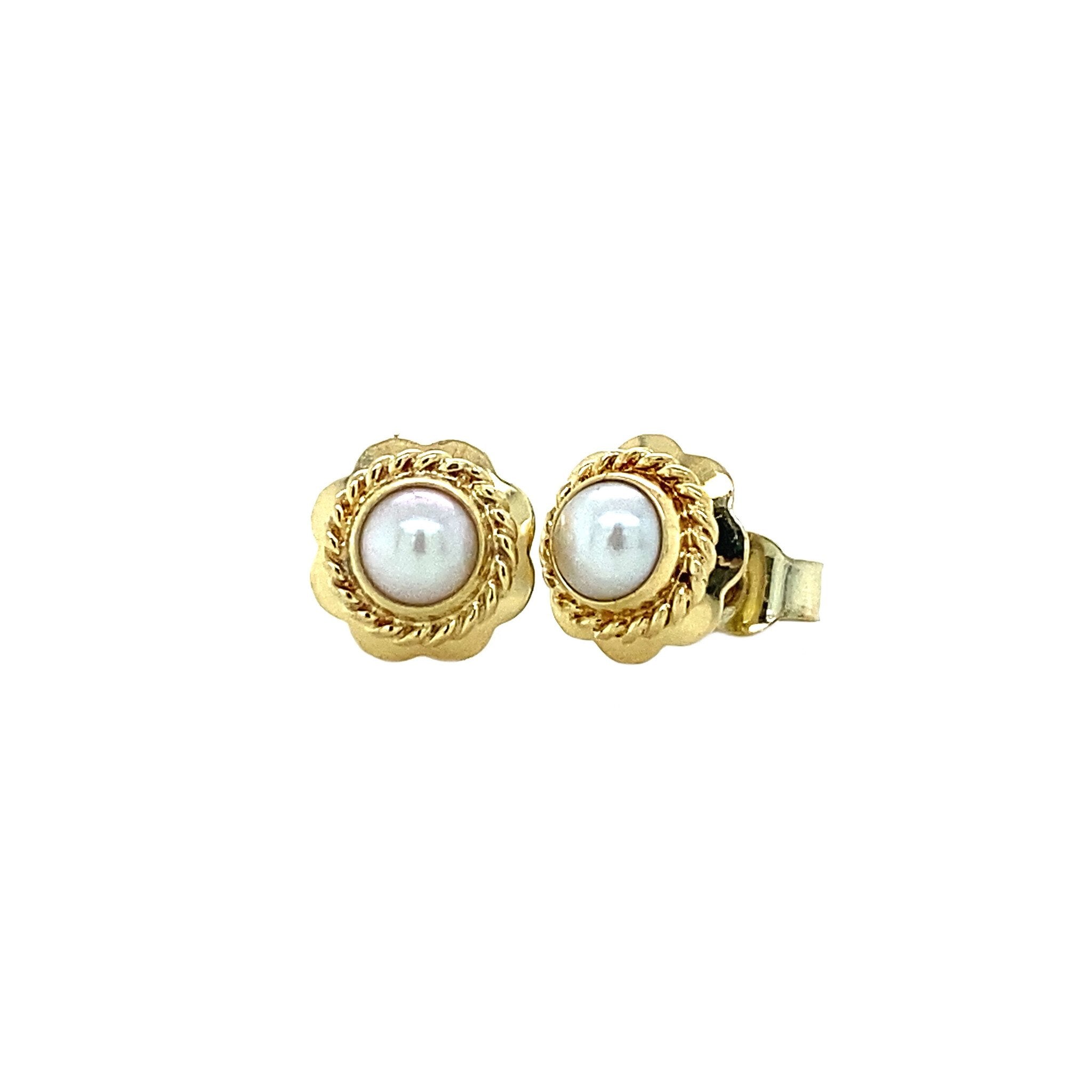 14 kt gold pearl stud earrings