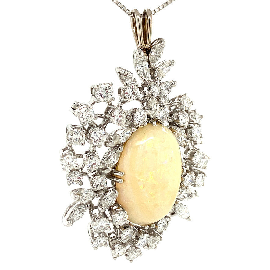 Witgouden hanger met opaal en diamant 14 krt