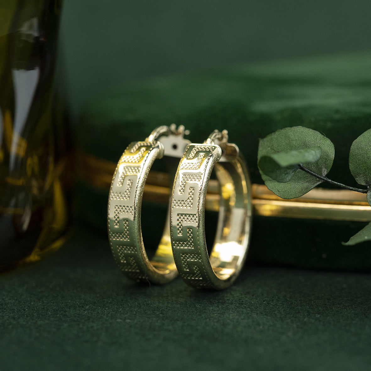 14 kt gold meander earrings