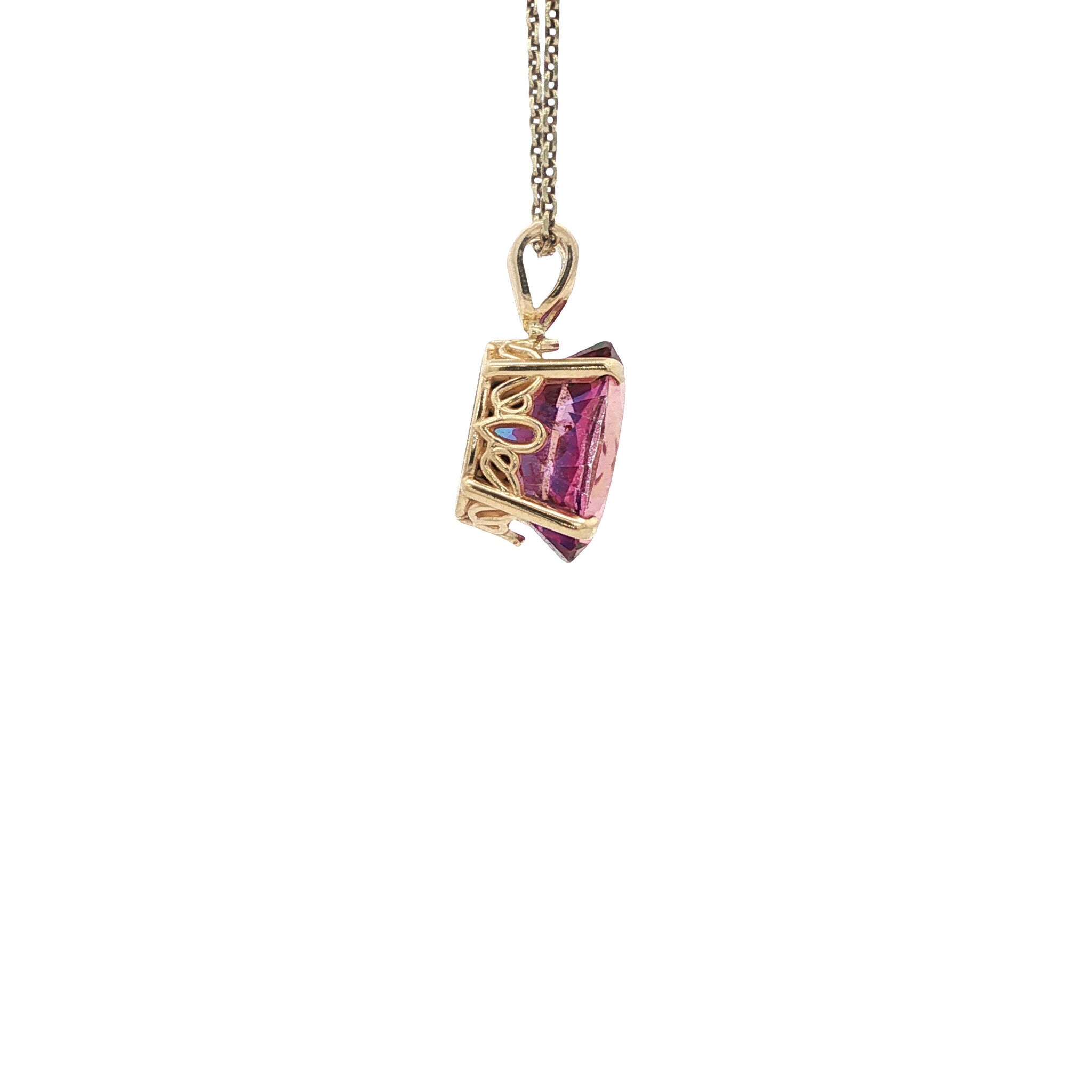 Gold pendant with a mystical topaz 14 kt