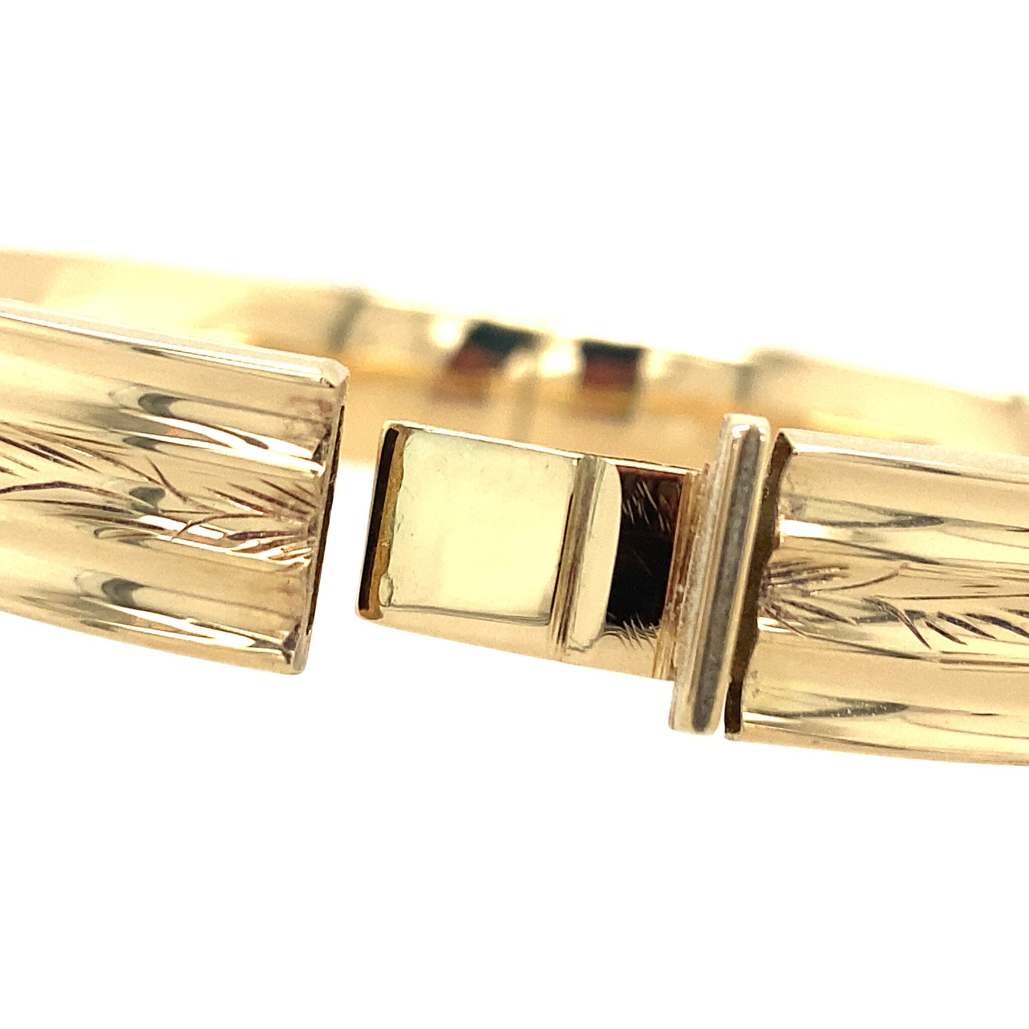 Gouden vintage bangle met gravure 14 krt