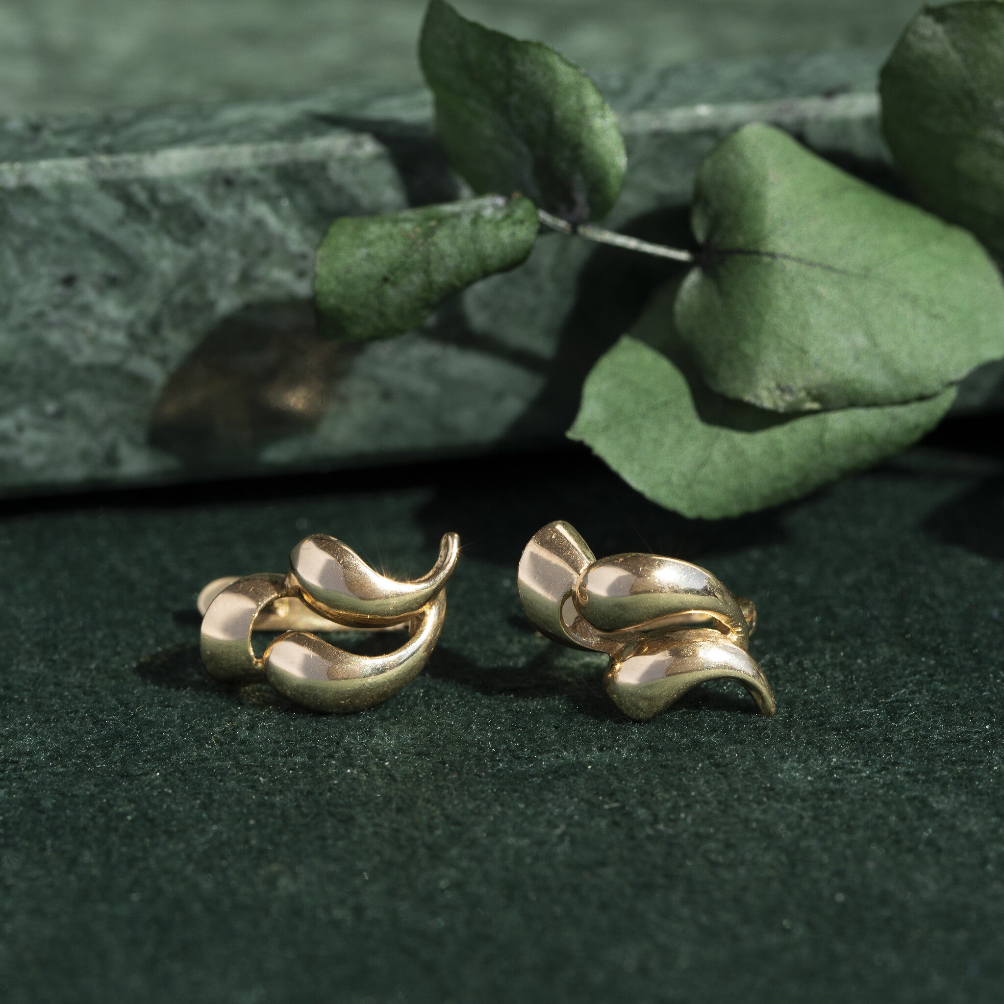 Gouden fantasie oorstekers 14 krt