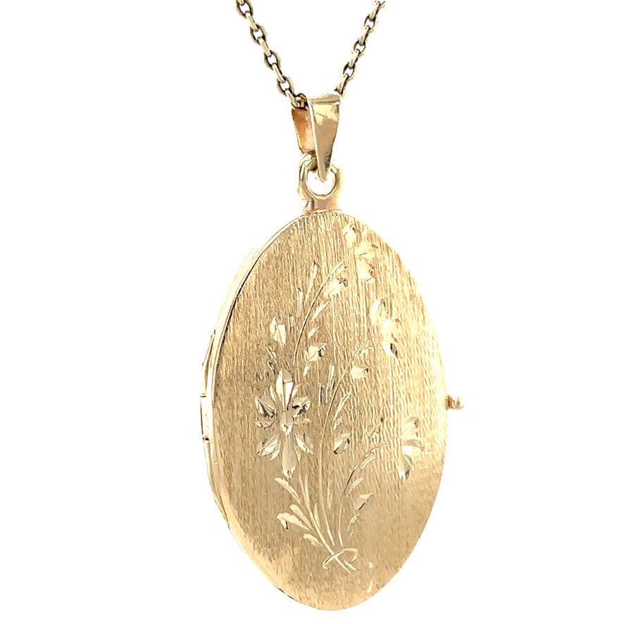 Vintage 18 kt gold locket with engraving
