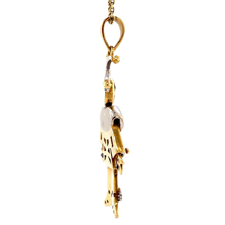 Gouden joker hanger met robijn, saffier en diamant 18 krt