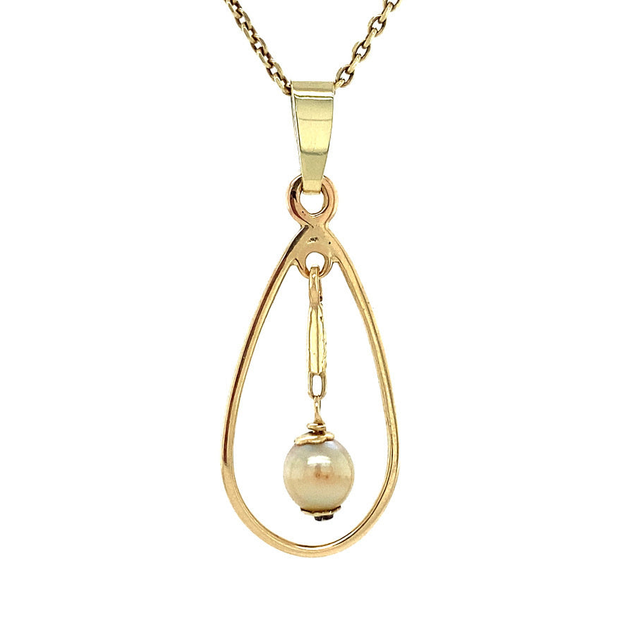 14 kt gold pendant with pearl