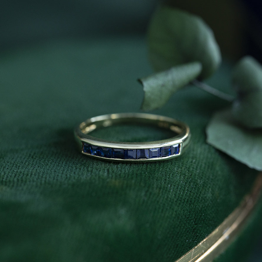 Gouden rijring met saffier 14 kt