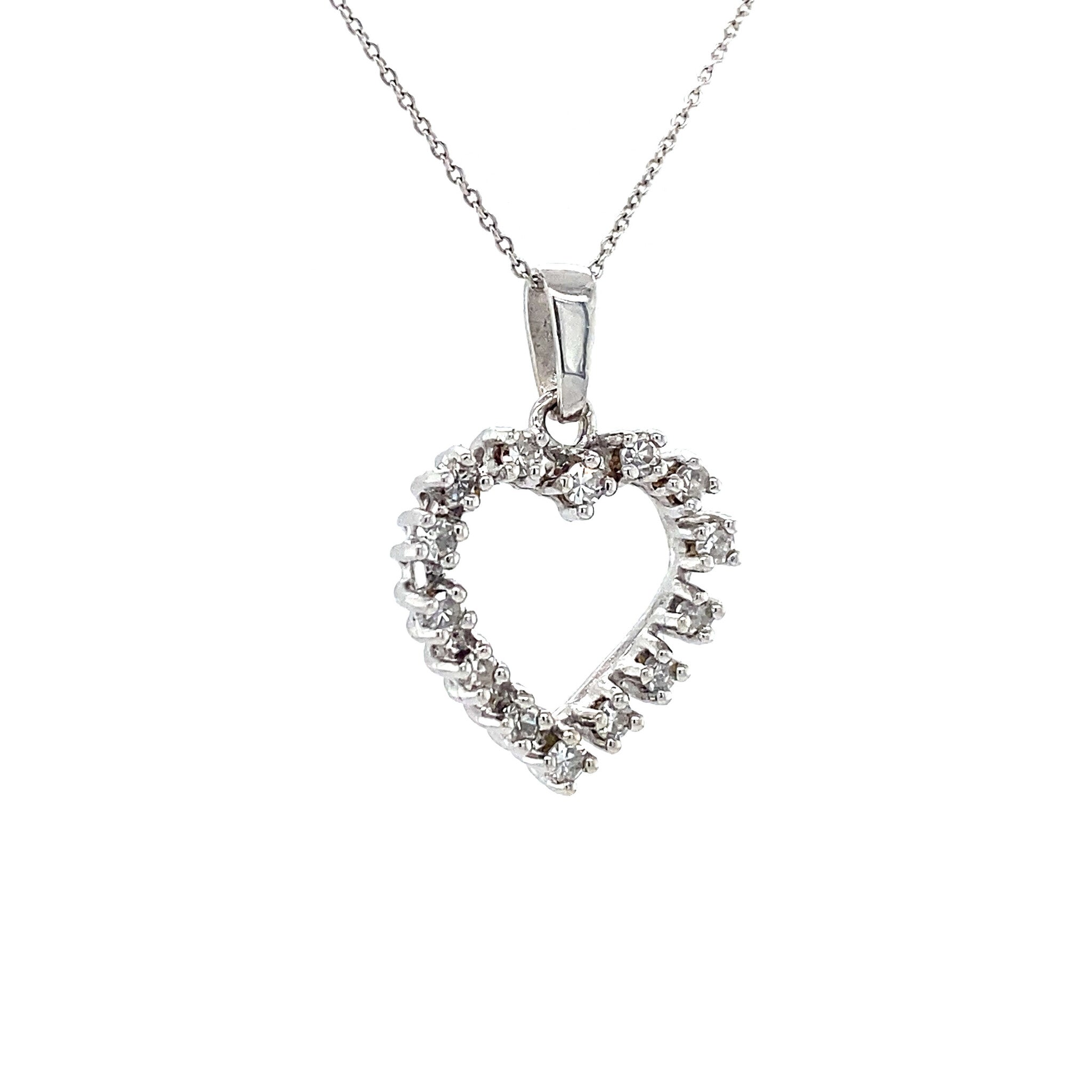 14 kt white gold heart pendant with diamond