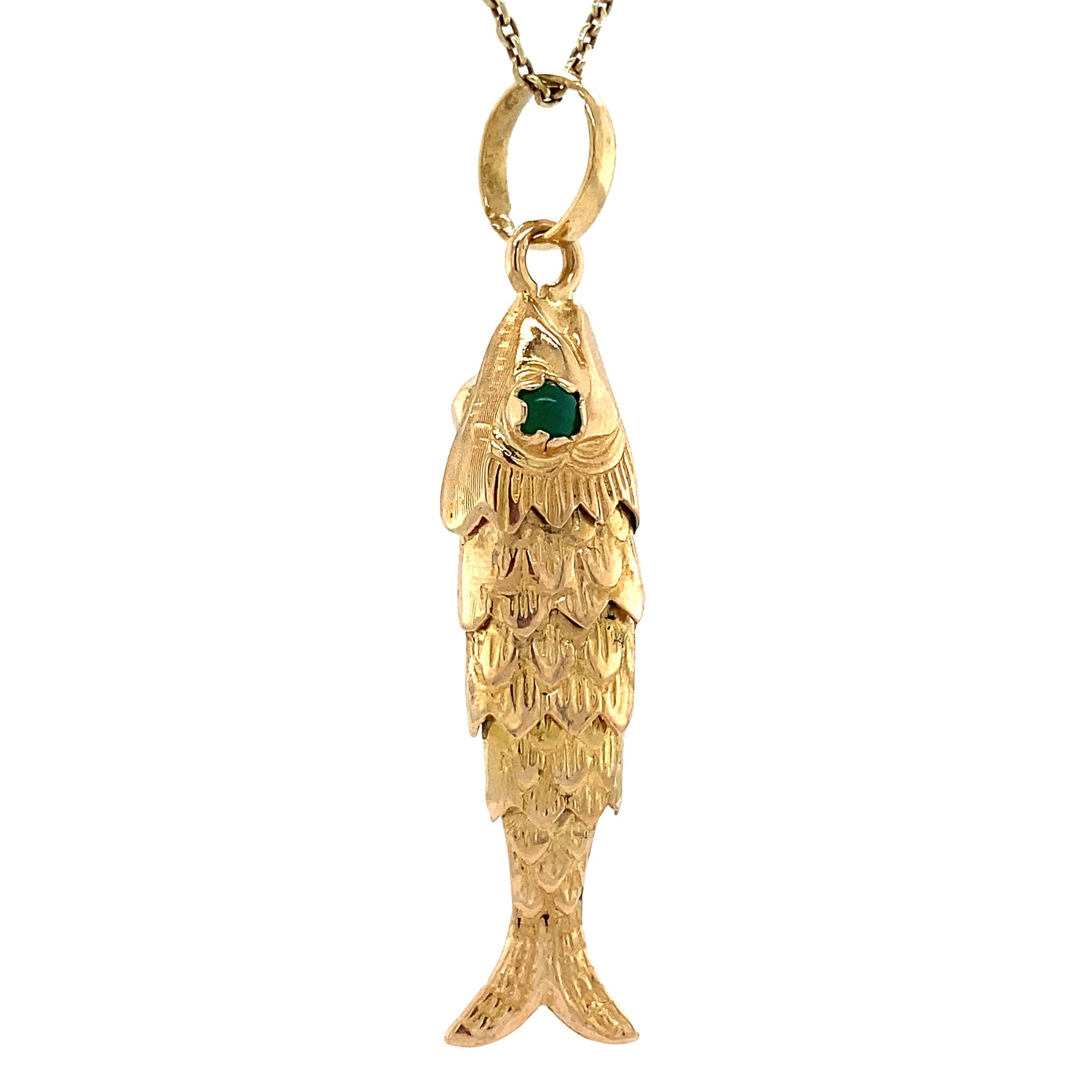 18 kt gold fish pendant with colored gemstone
