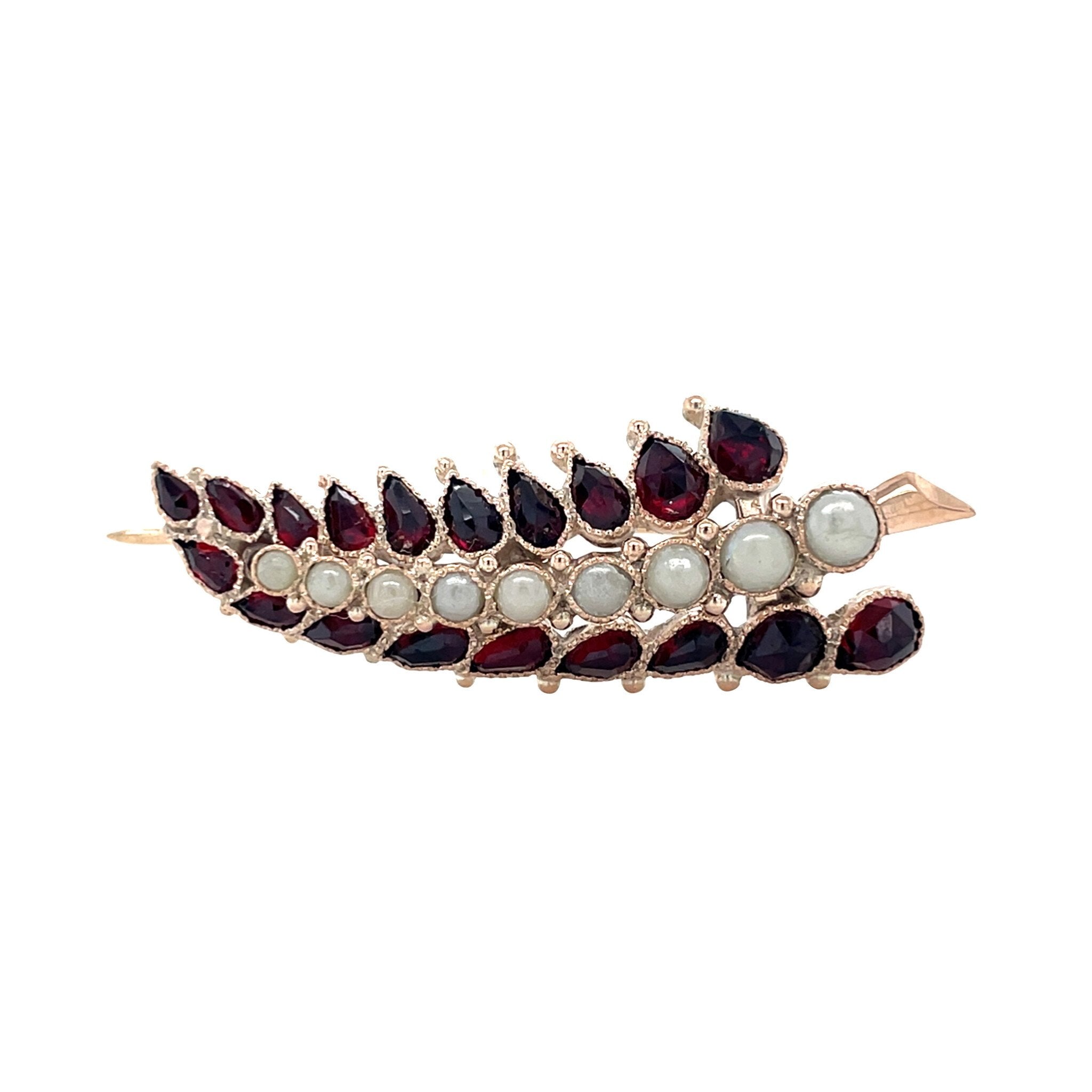 Gouden vintage broche met granaat en parel 14 krt