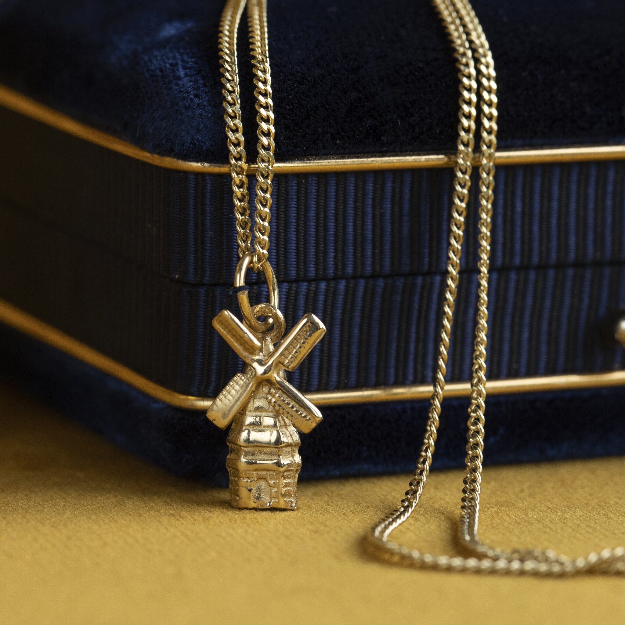 14 kt gold Dutch windmill pendant