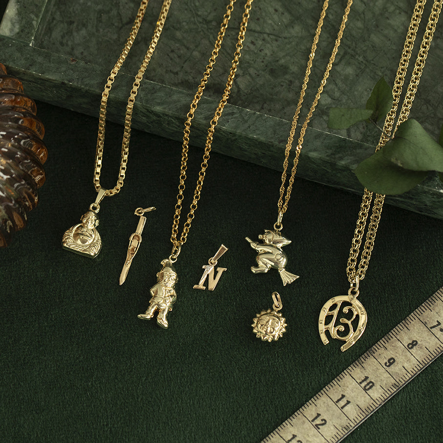 Gouden vintage langlaufski hanger 14 kt