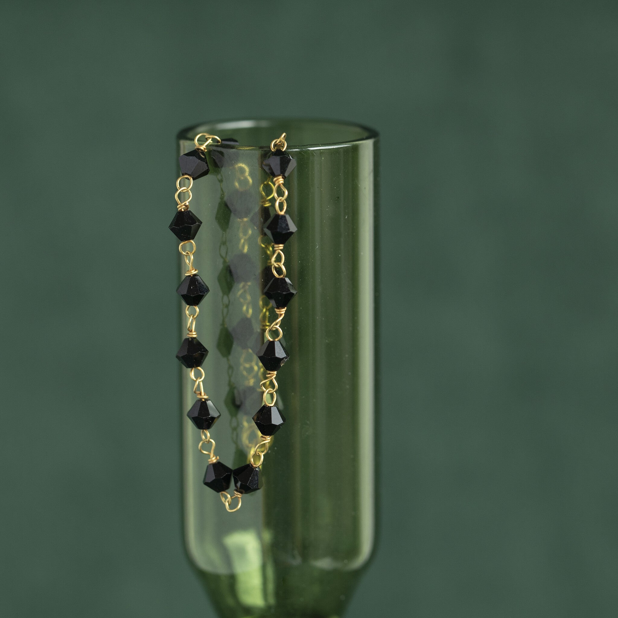 Gold bracelet with onyx 14 krt