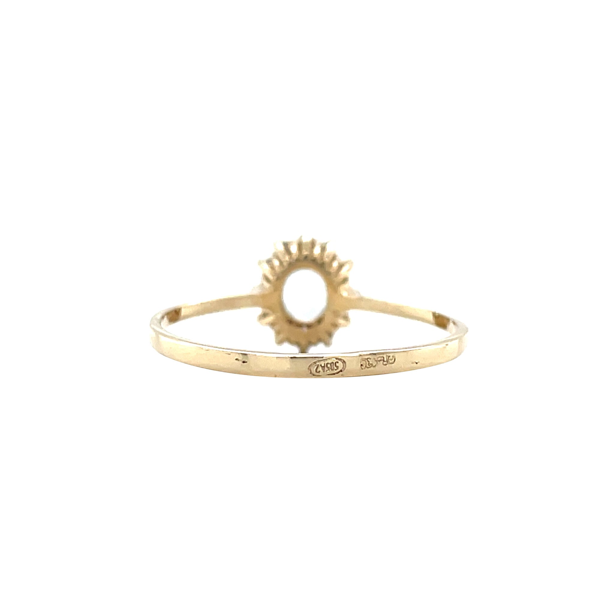 Vintage gold entourage ring with aquamarine and diamond, 14 kt