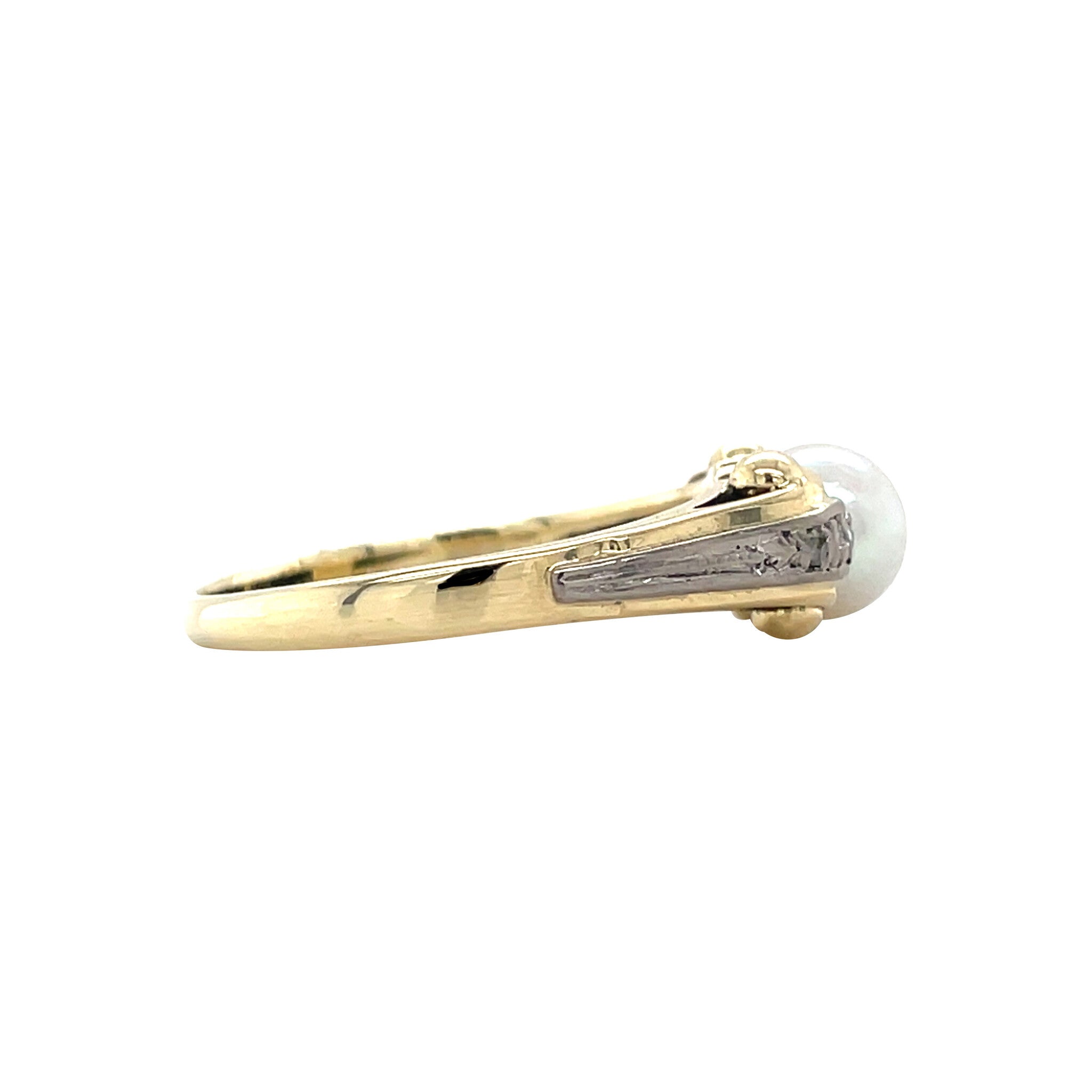 Gouden vintage ring met parel en diamant 14 krt