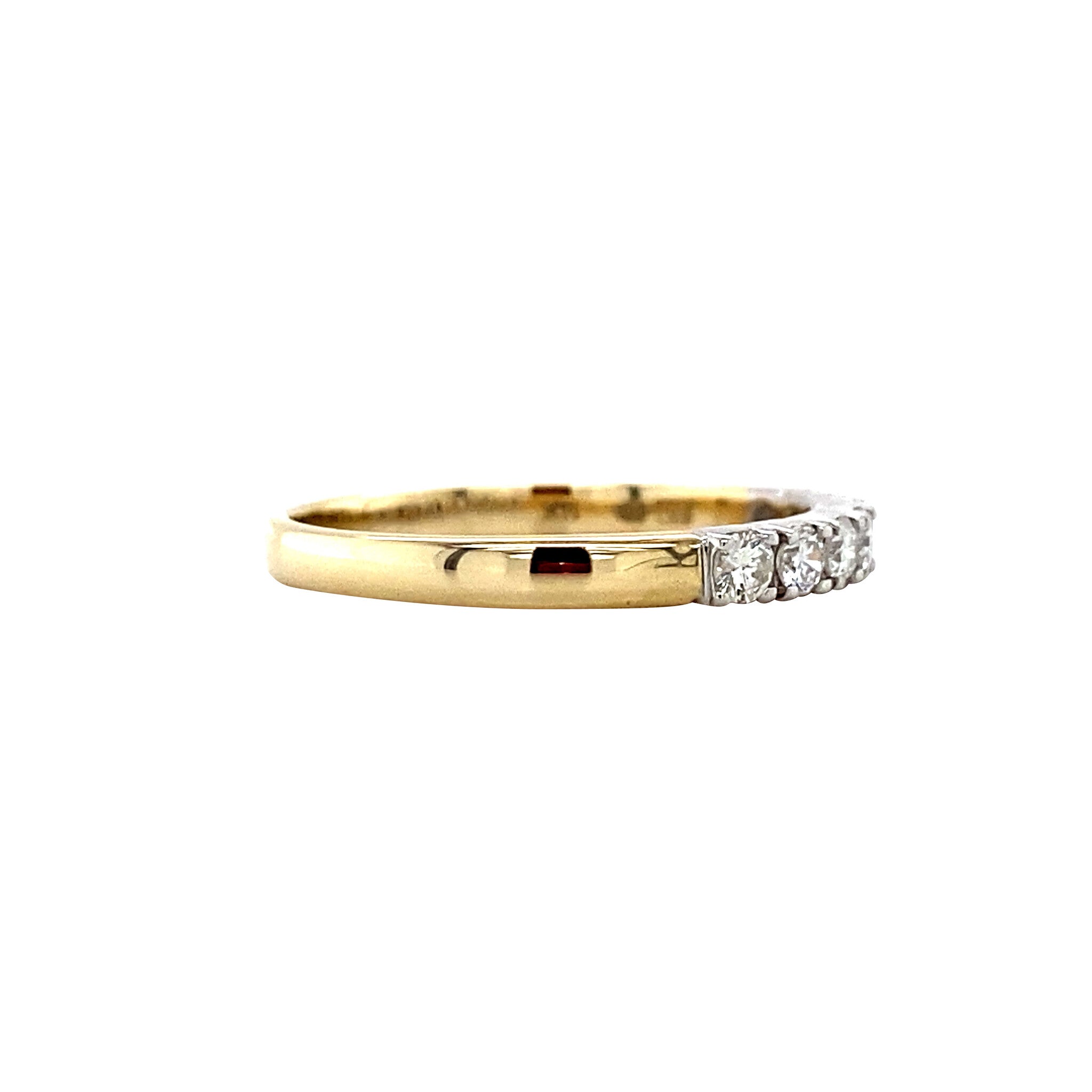 14 kt gold row ring with a diamond.