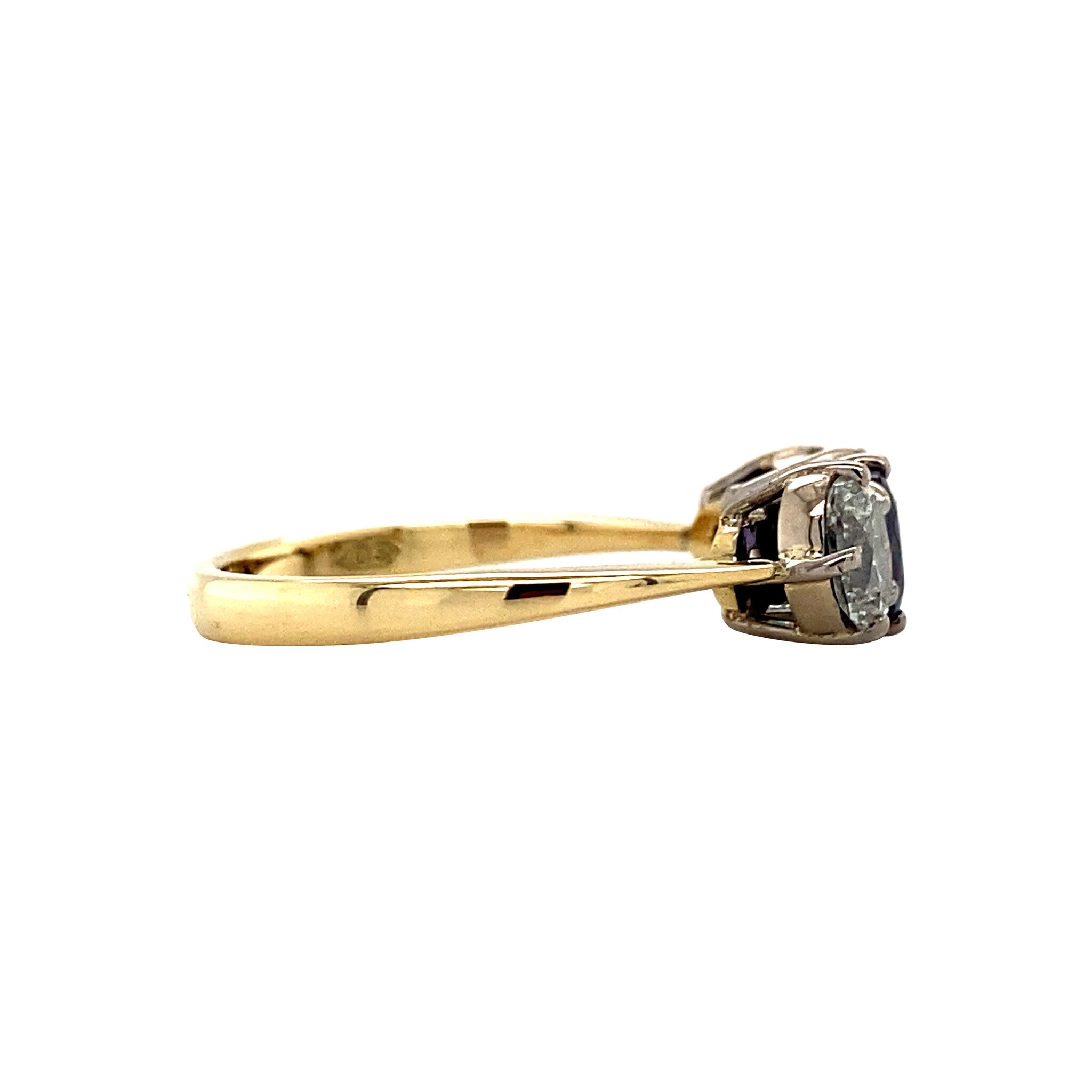 18 kt gold row ring with sapphire and diamond
