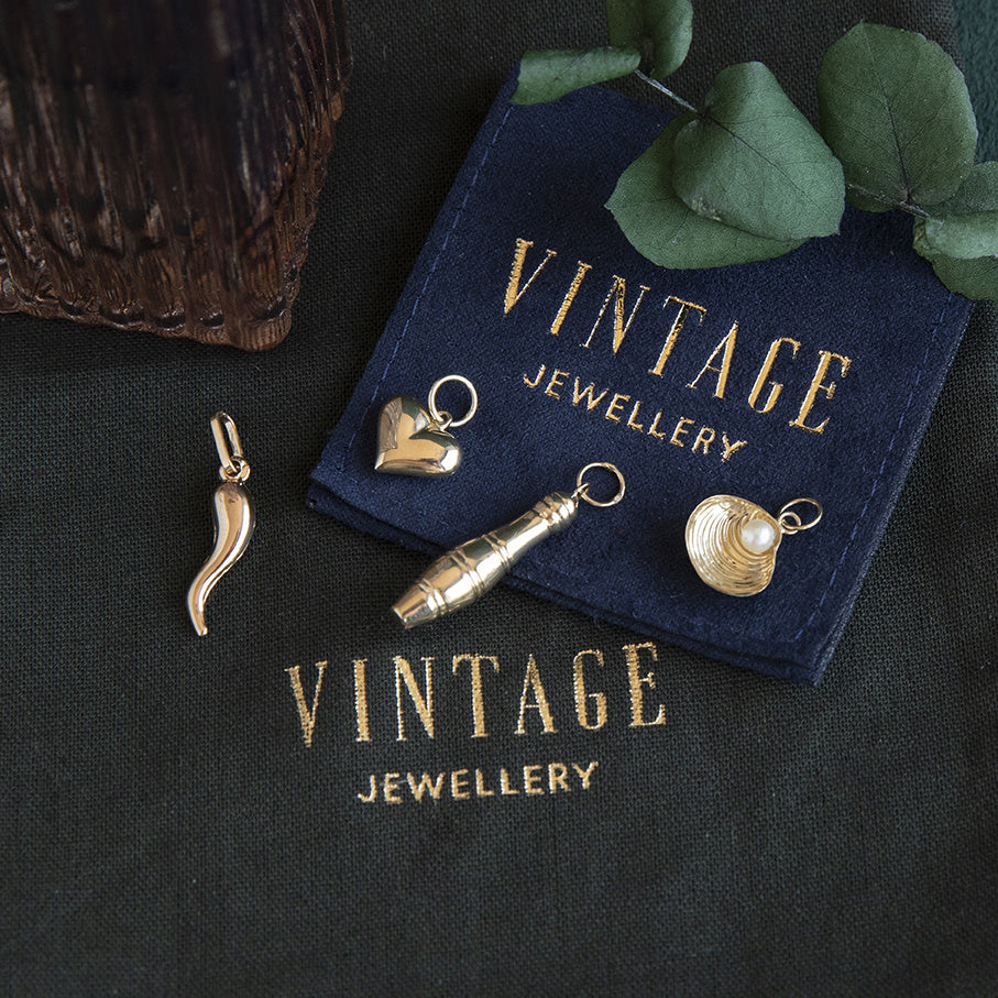 Golden vintage key pendant 14 kt