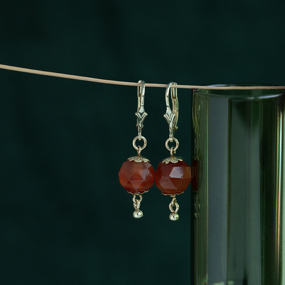 14 kt gold earrings with carnelian.