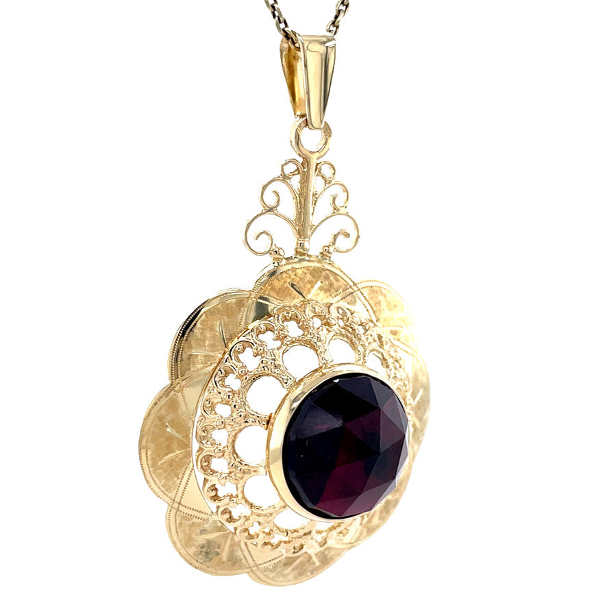 Gouden vintage hanger met granaat 14 krt