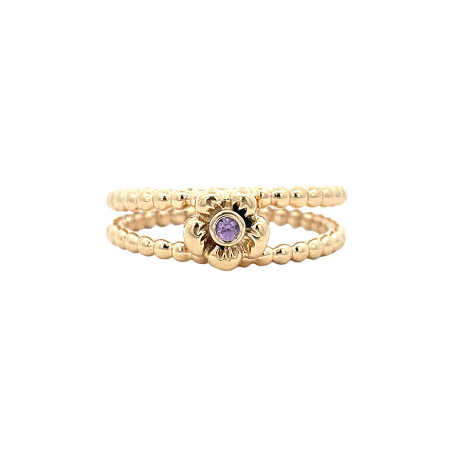 Vintage 14 kt gold flower ring with sapphire.